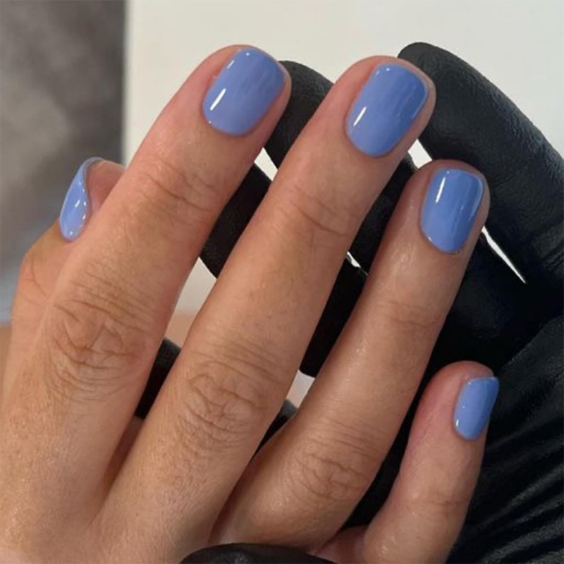 Periwinkle nails that make your skin look more tan and enhance a sun-kissed glow.