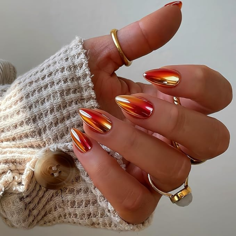 Fall chrome nail idea featuring autumn leaf chrome