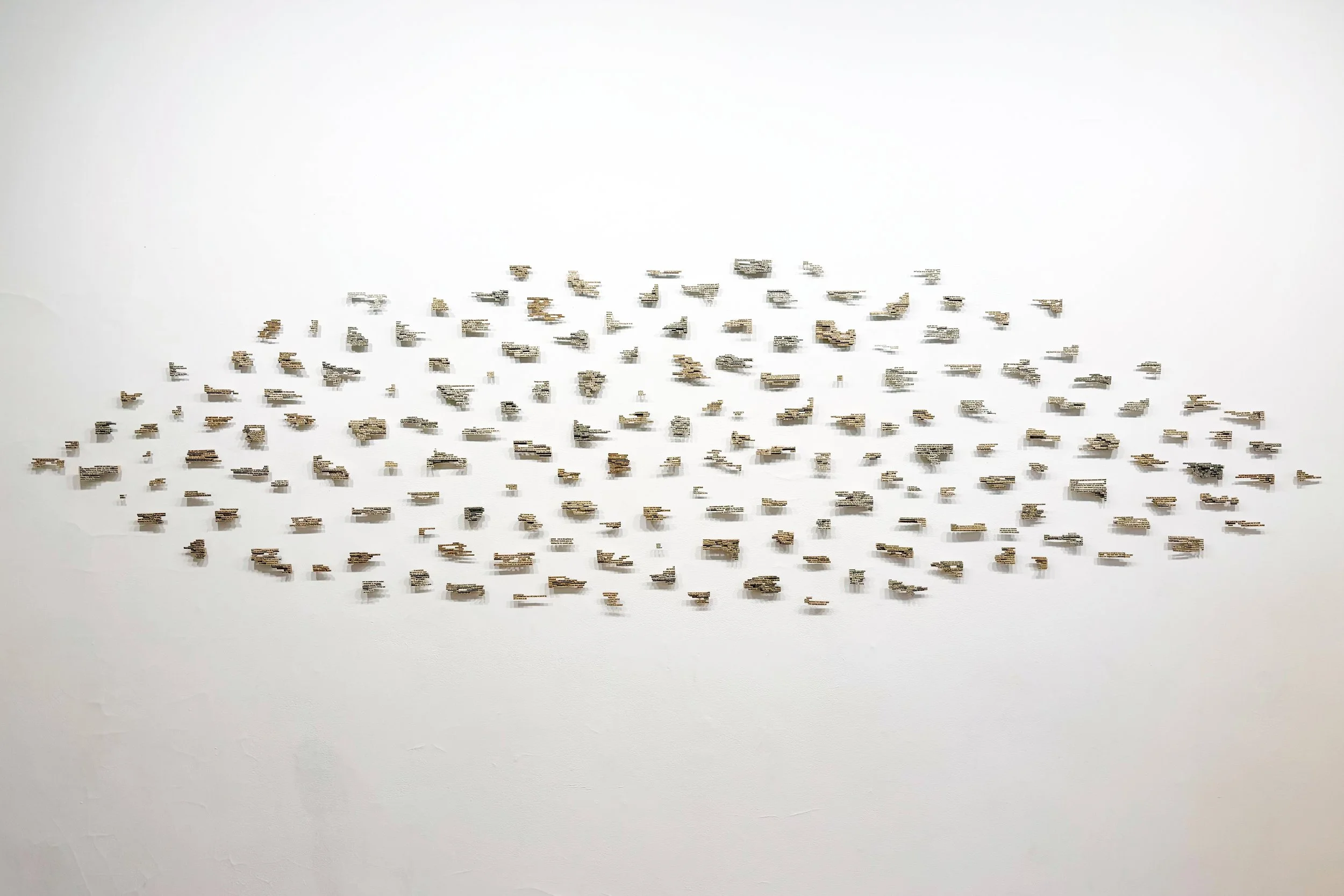 Fragments (from Faulkner) 2020-2025, paperback books, acrylic varnish, thumbtacks, dimensions variable