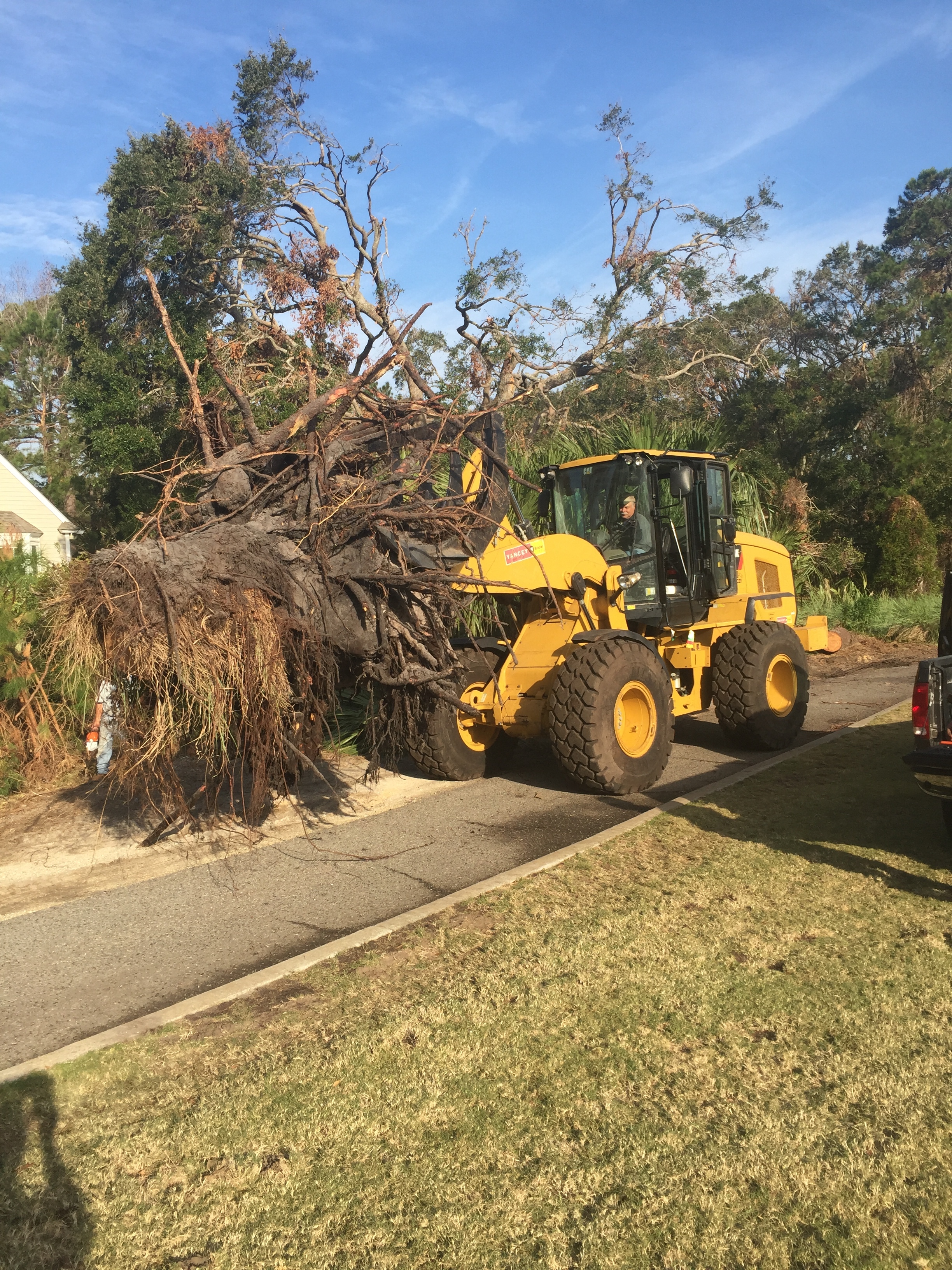 Hcane mathew equipment moving debris.JPG