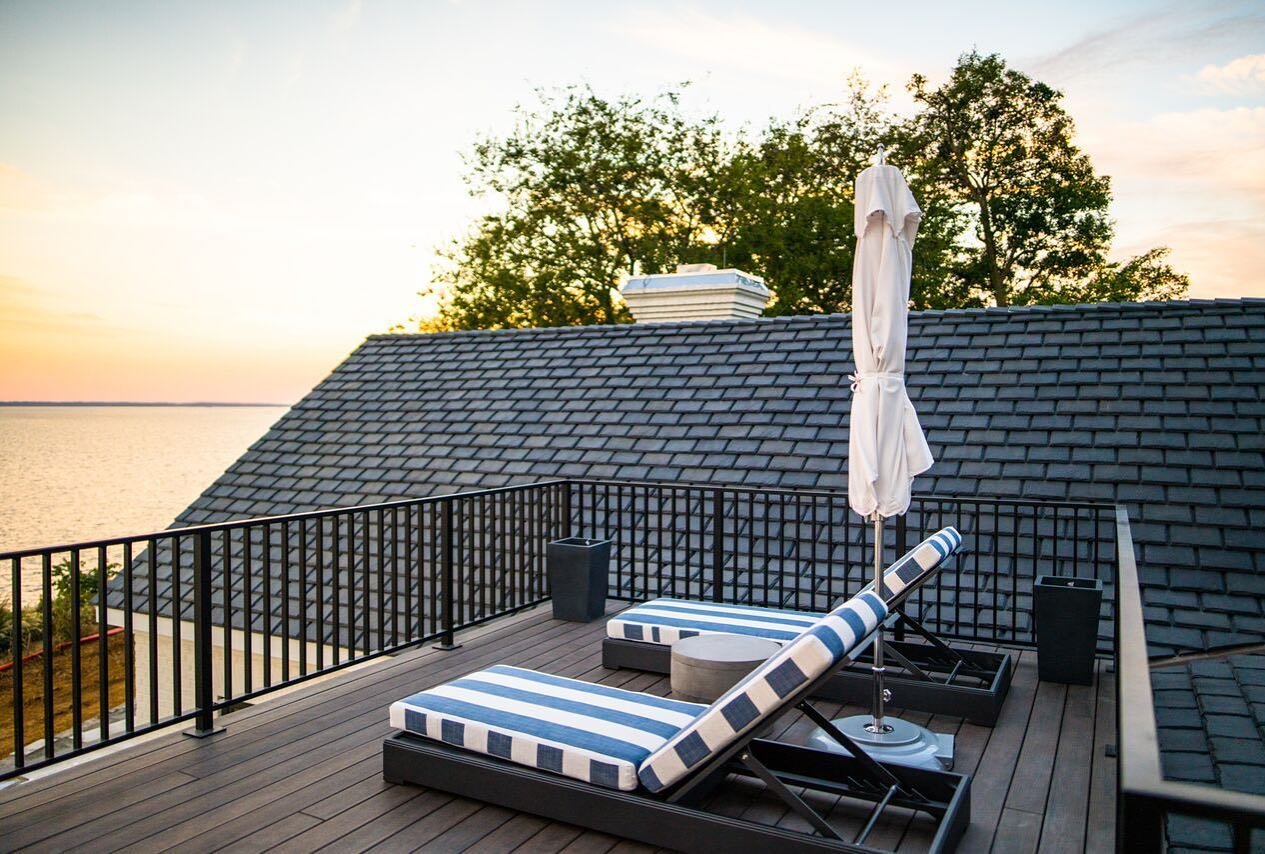 It&rsquo;s the perfect time of year for watching sunsets with a glass of wine on a beautiful patio like this! #sunsets #interiordesigner #williamsburg #outdoorfurniture #hayleyholmaninteriors #vino #perfectlycurated