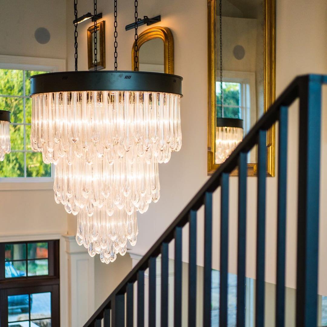 A few interior shots from our renovation project! Project: Private Residence - Williamsburg, VA.  #renovationproject #interiordesign #hayleyholmaninteriors #okcinteriordesigner #mixedmetals #customdoors #warmtones #crystalchandeliers