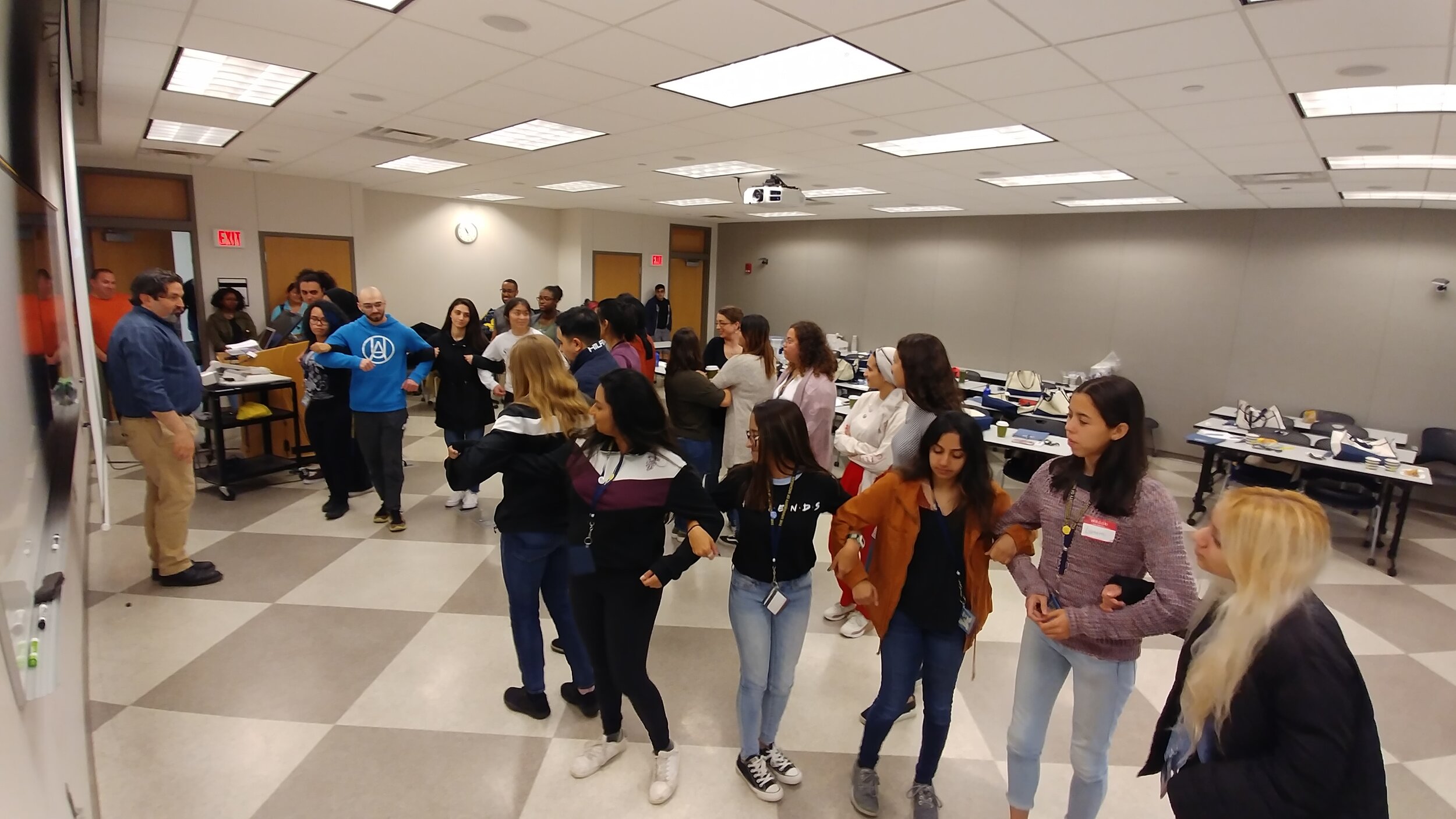  Students link arms for the Gastrulation Dance, led by Dr. Scott Barolo 