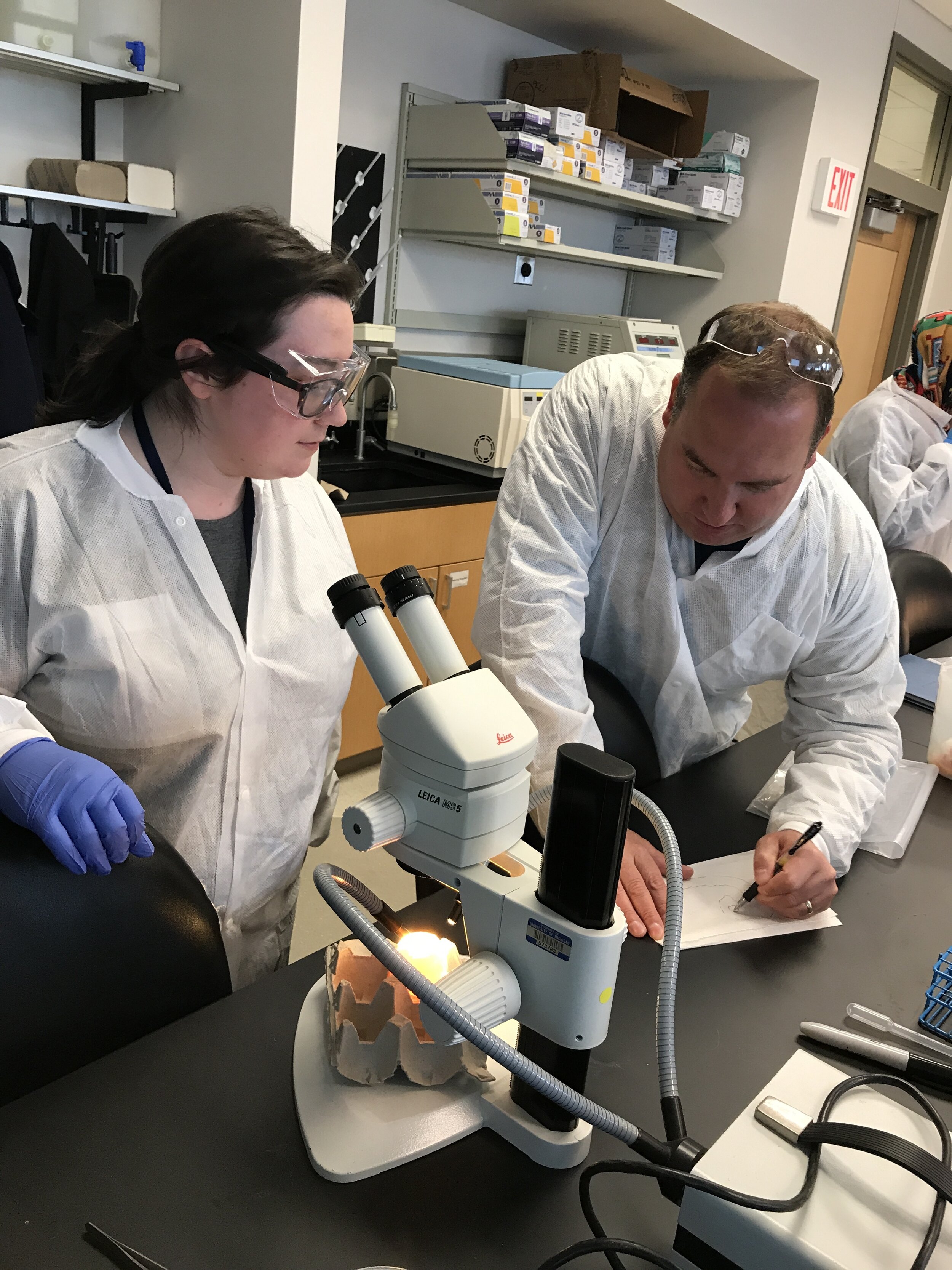  Dr. Ben Allen assists a student in the lab 