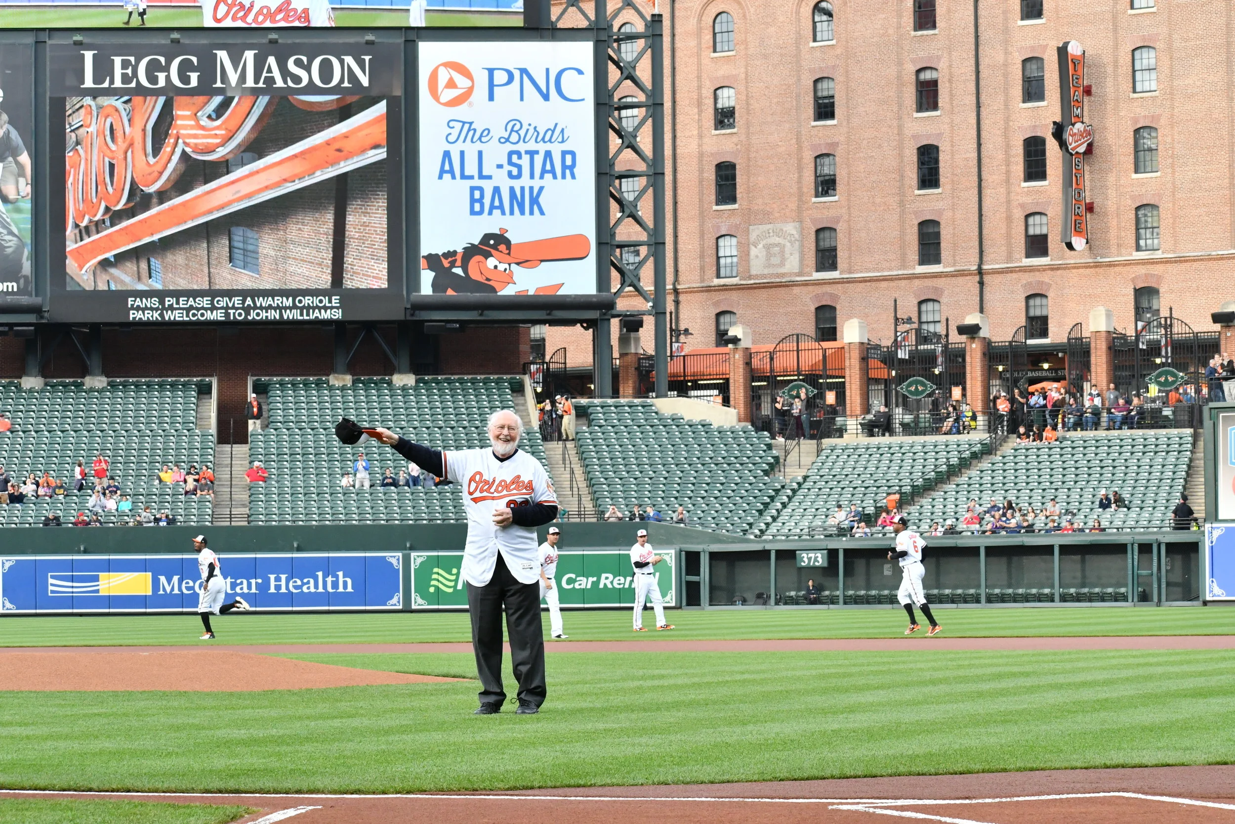 John Williams throws out the first pitch at a Baltimore Orioles game