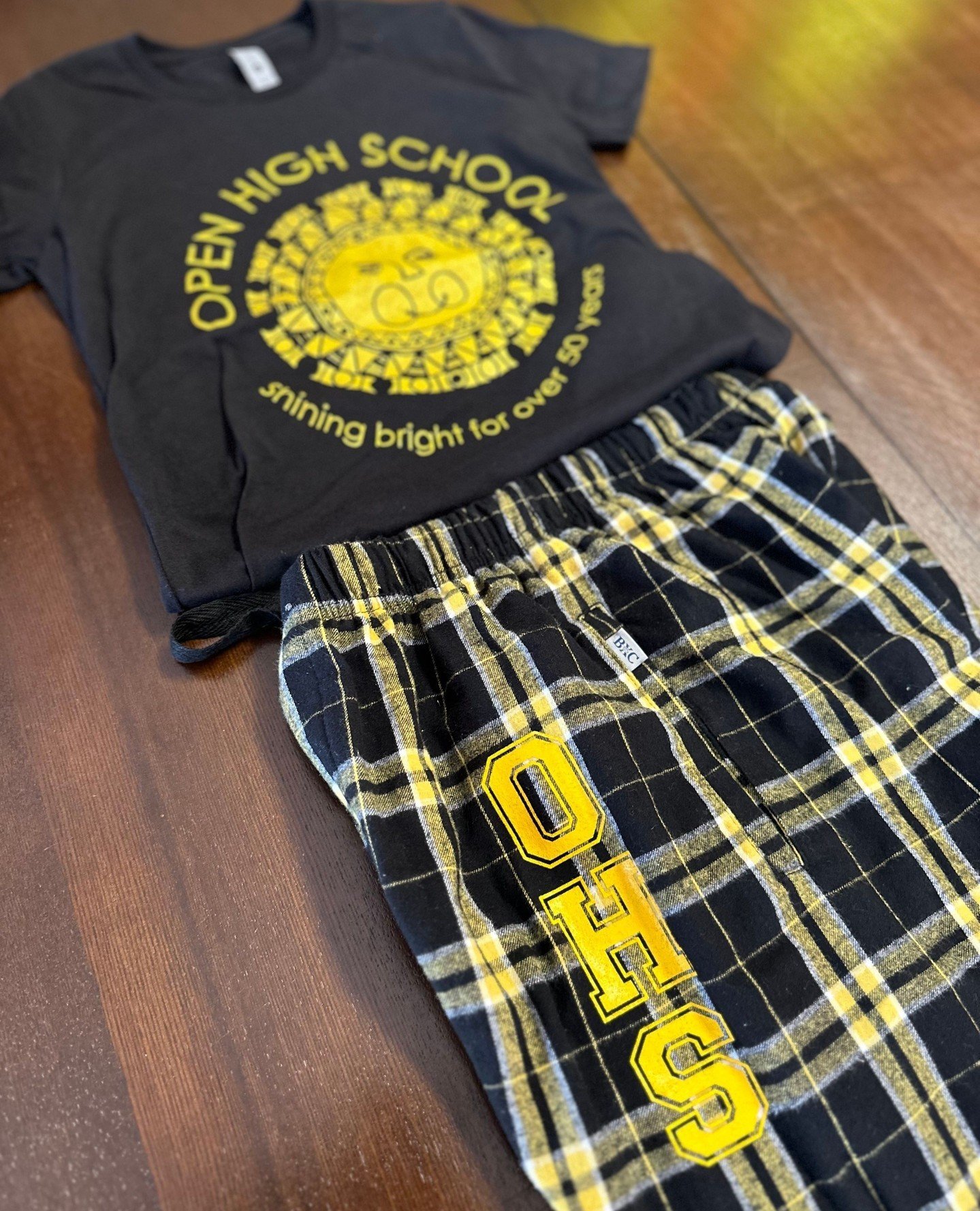 The full fit of cozy spiritwear for Open High School in RVA! Absolutely loving how well the plaid matches their screen printed letters. If you can wear it, we can print it!