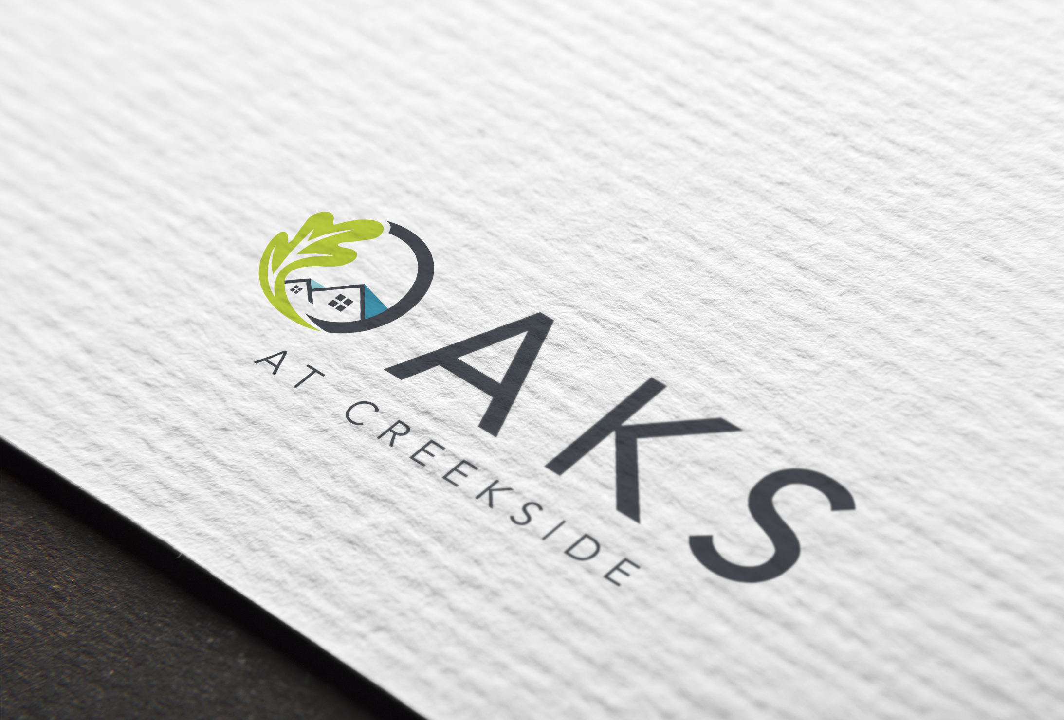 Oaks at Creekside logo.png