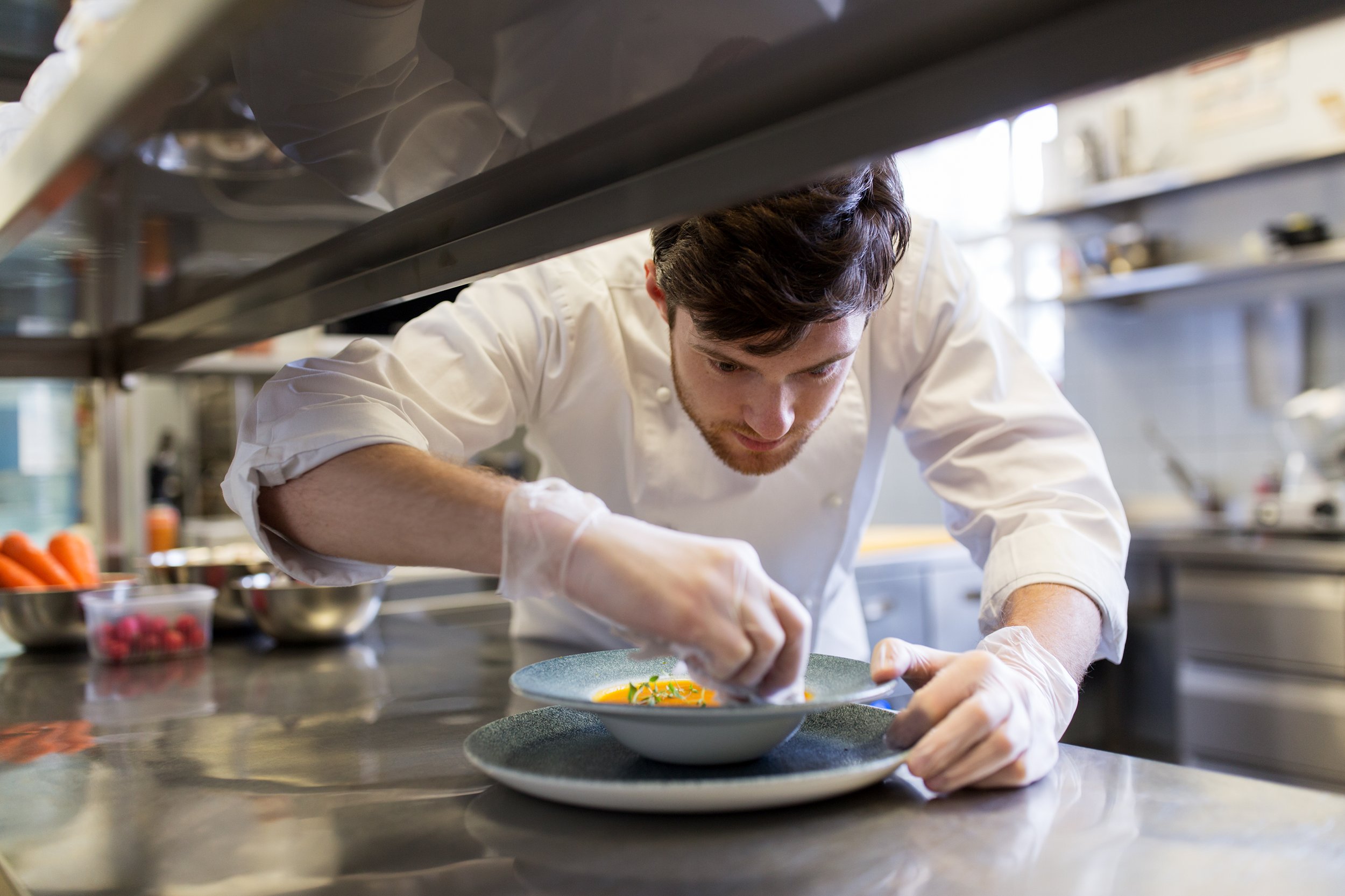 food-cooking-profession-people-concept-happy-male-chef-cook-serving-plate-soup-restaurant-kitchen.jpg