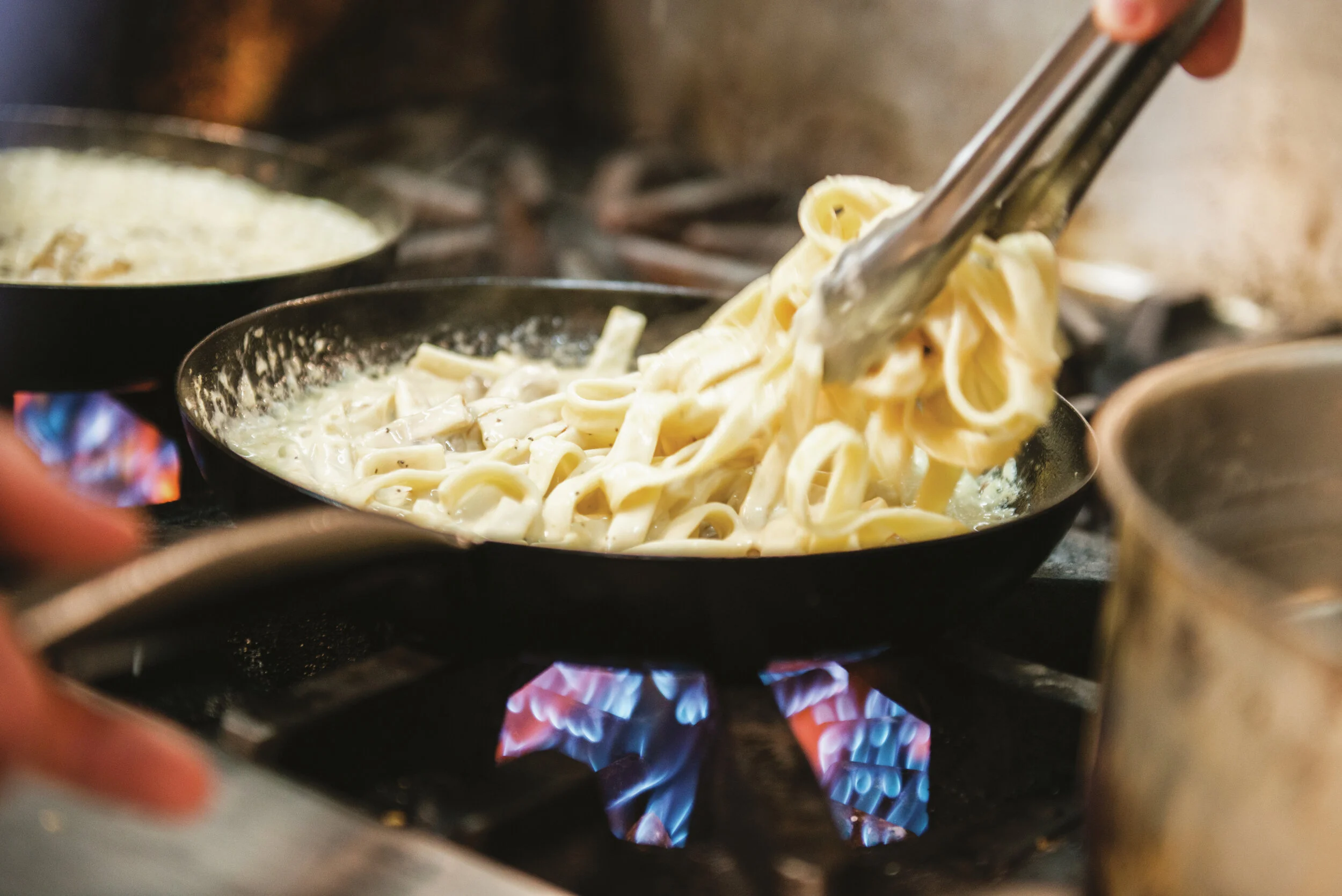 Pasta Cooking with Tongs.jpg