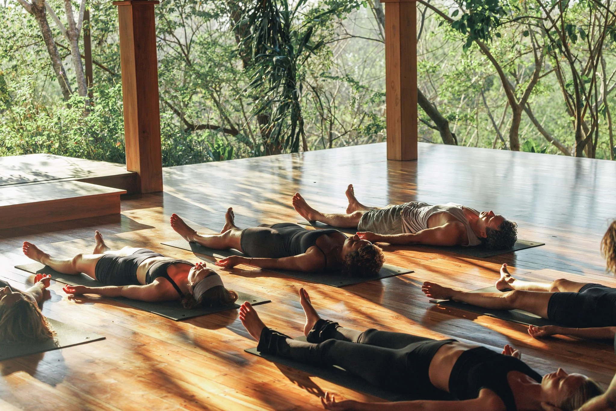 People on yoga mats at Bodhi Tree Yoga Resort