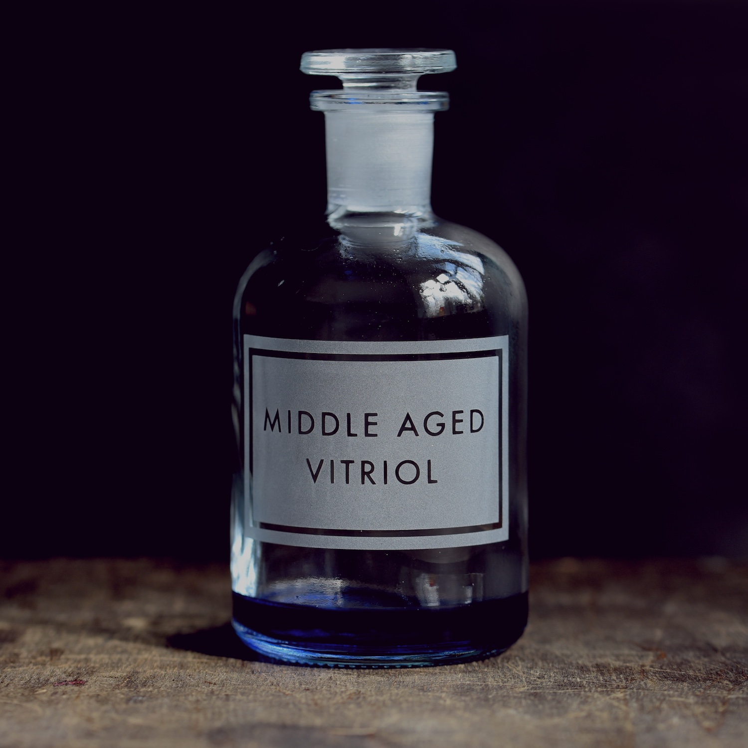 Hey, Vitriol!!! Middle-aged-vitriol-etched-apothecary-bottle-vinegar-and-brown-paper