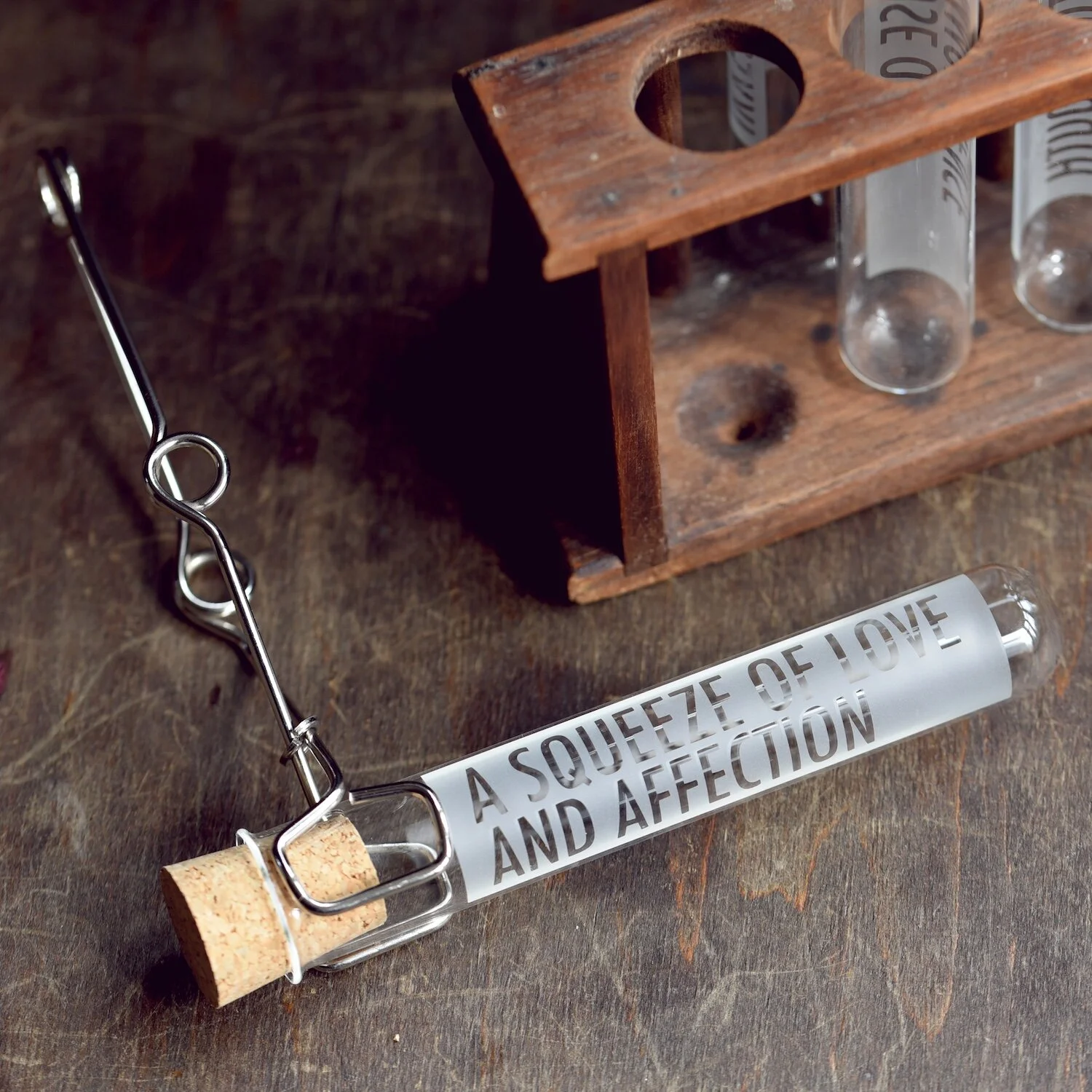 a-squeeze-of-love-and-affection-etched-test-tube-vinegar-and-brown-paper.jpg