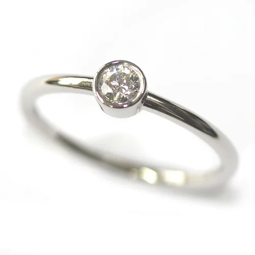 Platinum Rub Set Diamond Solitaire Engagement Ring.jpg