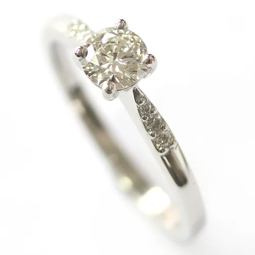 Platinum Engagement Ring with Elegant Diamond Detail