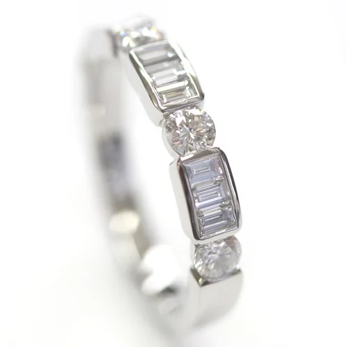 Platinum Round Brilliant Cut and Baguette Cut Diamond Eternity Ring 1.jpg