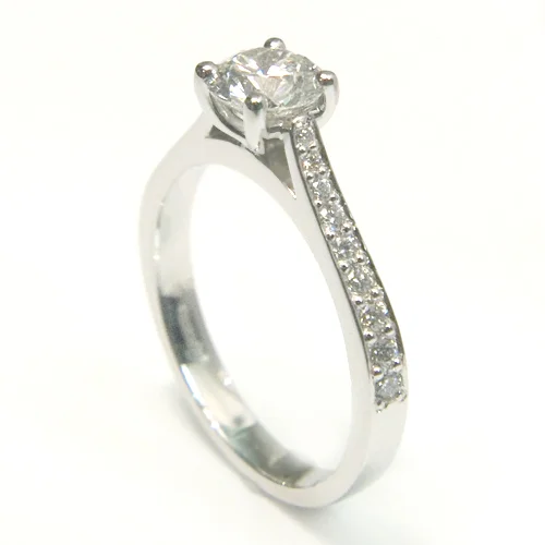 Platinum Round Brilliant Cut Diamond Engagement Ring with Diamond Set Shoulders.jpg