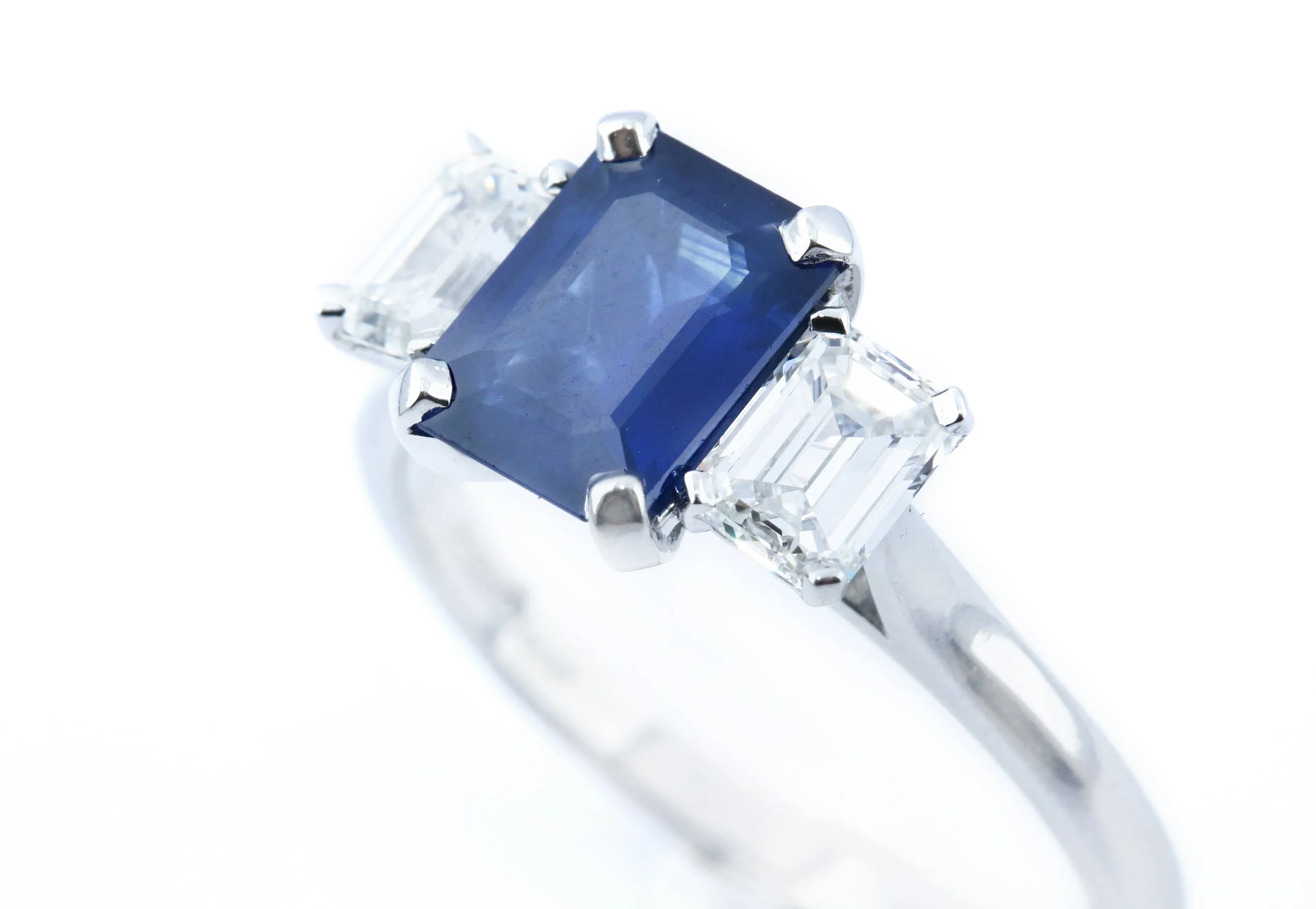 Platinum Trilogy Engagement Ring with Sapphire and Diamonds