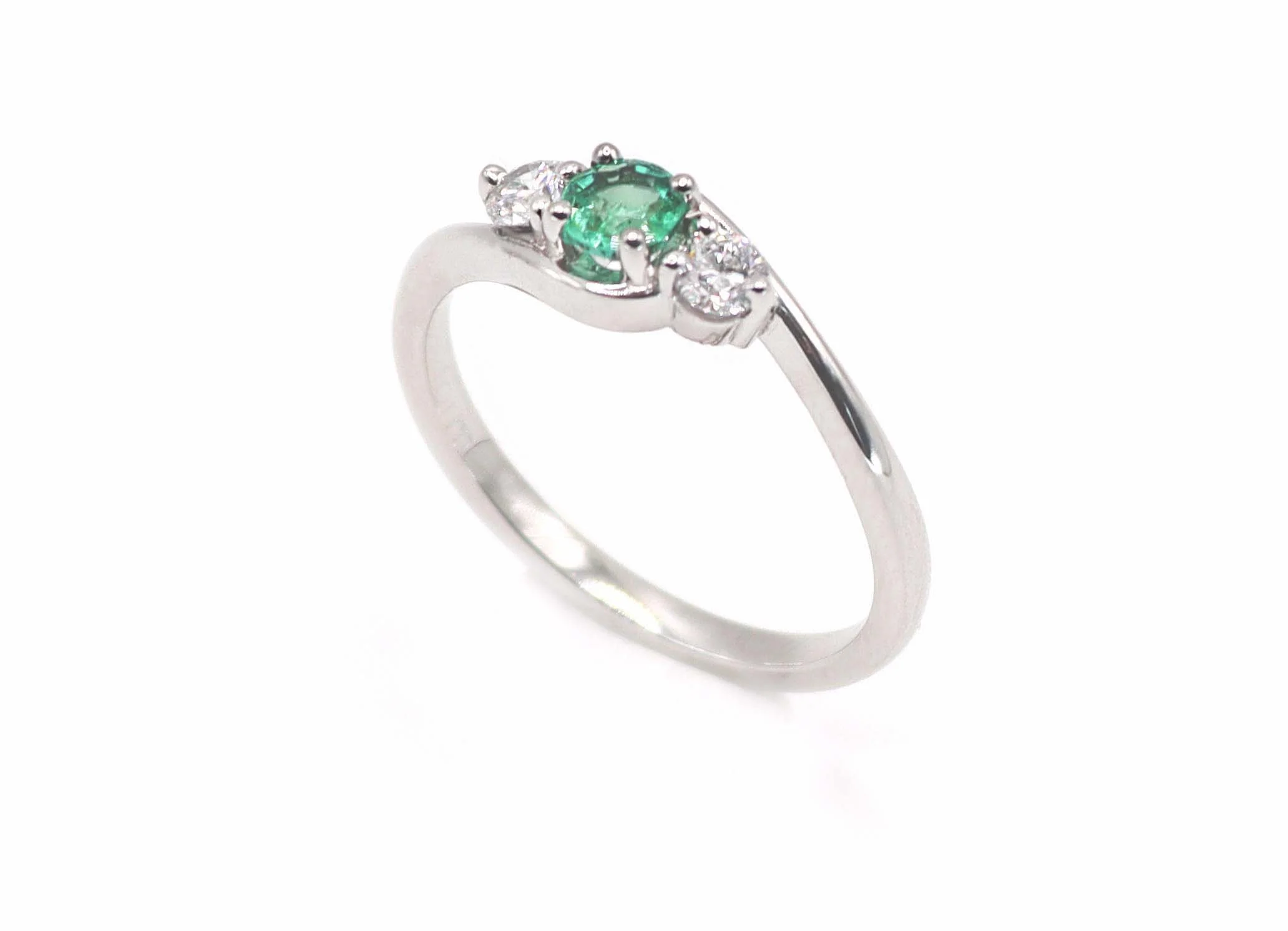 Platinum Crossover Round Brilliant Cut Diamond and Emerald Engagement Ring