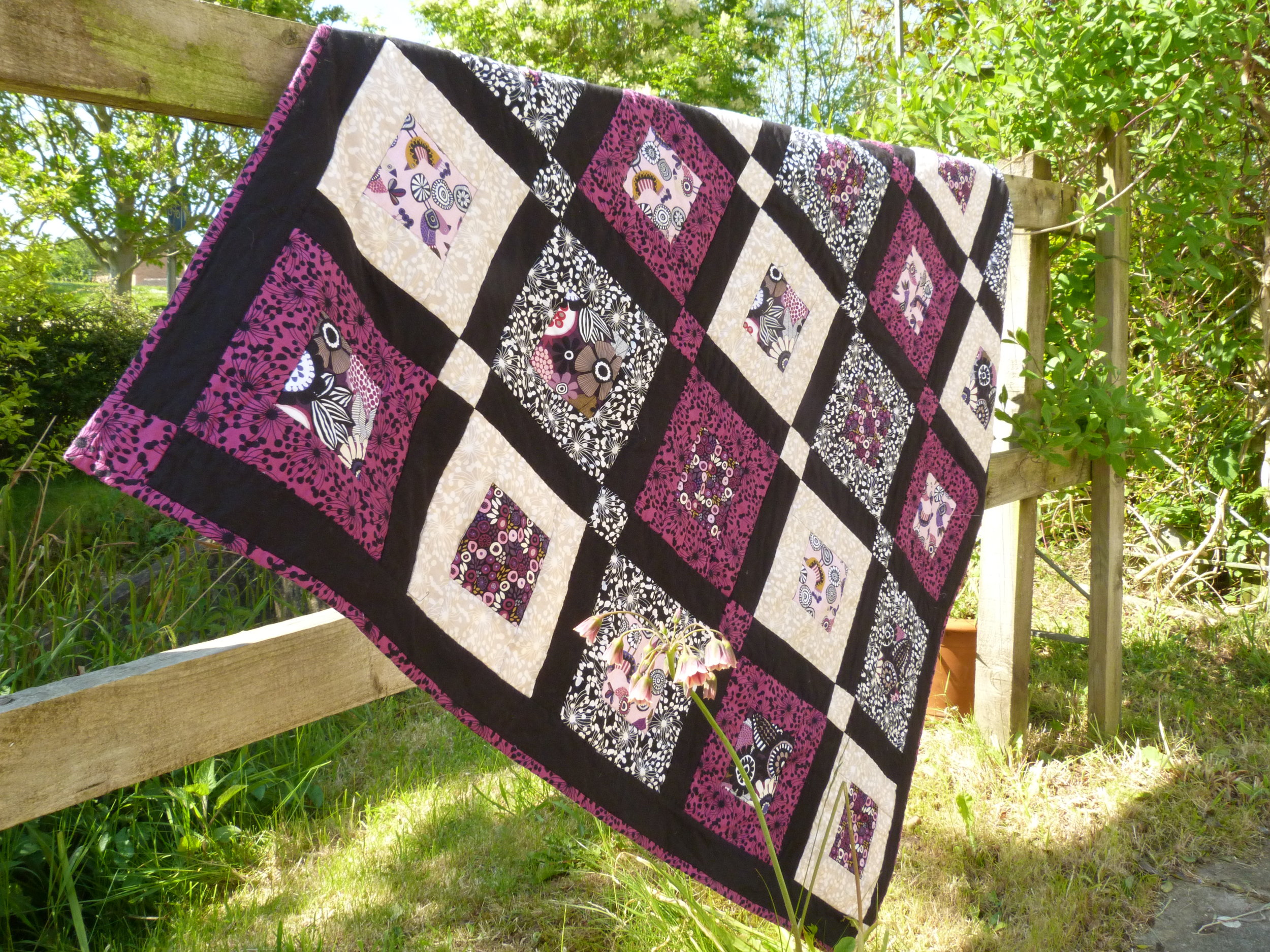 Birds and Blooms quilt mywork.JPG