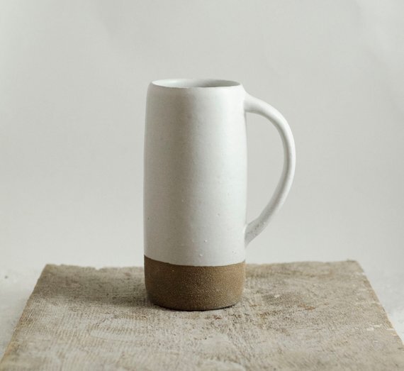 speckled white homemade ceramic mug