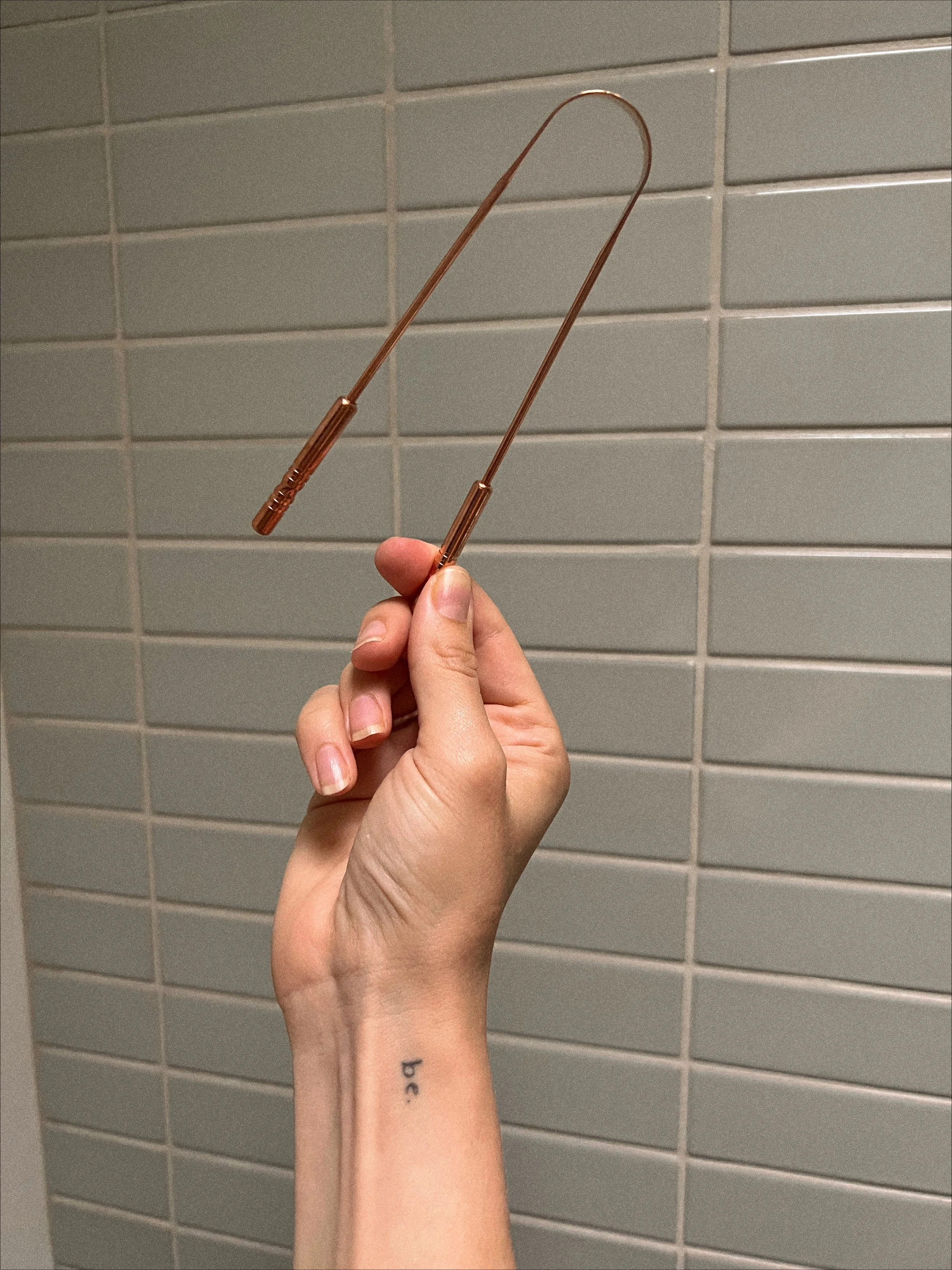 What Is Tongue Scraping (...and HOW Do You Actually Do It?!)