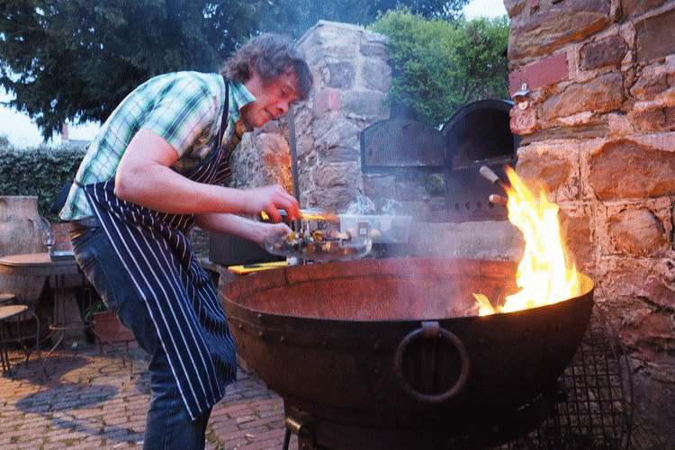 bordello banquets firepit campfire cooking.gif