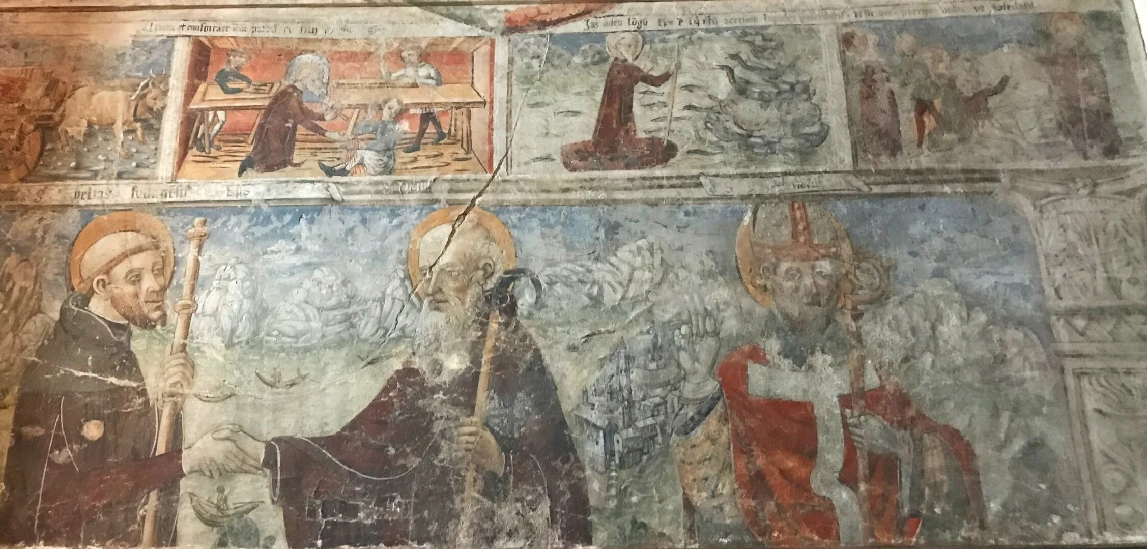 San Giulio is the patron saint of builders (here are some 15th-c frescoes dedicated to him, from the Basilica di San Giulio, Lake Orta, Piedmont).