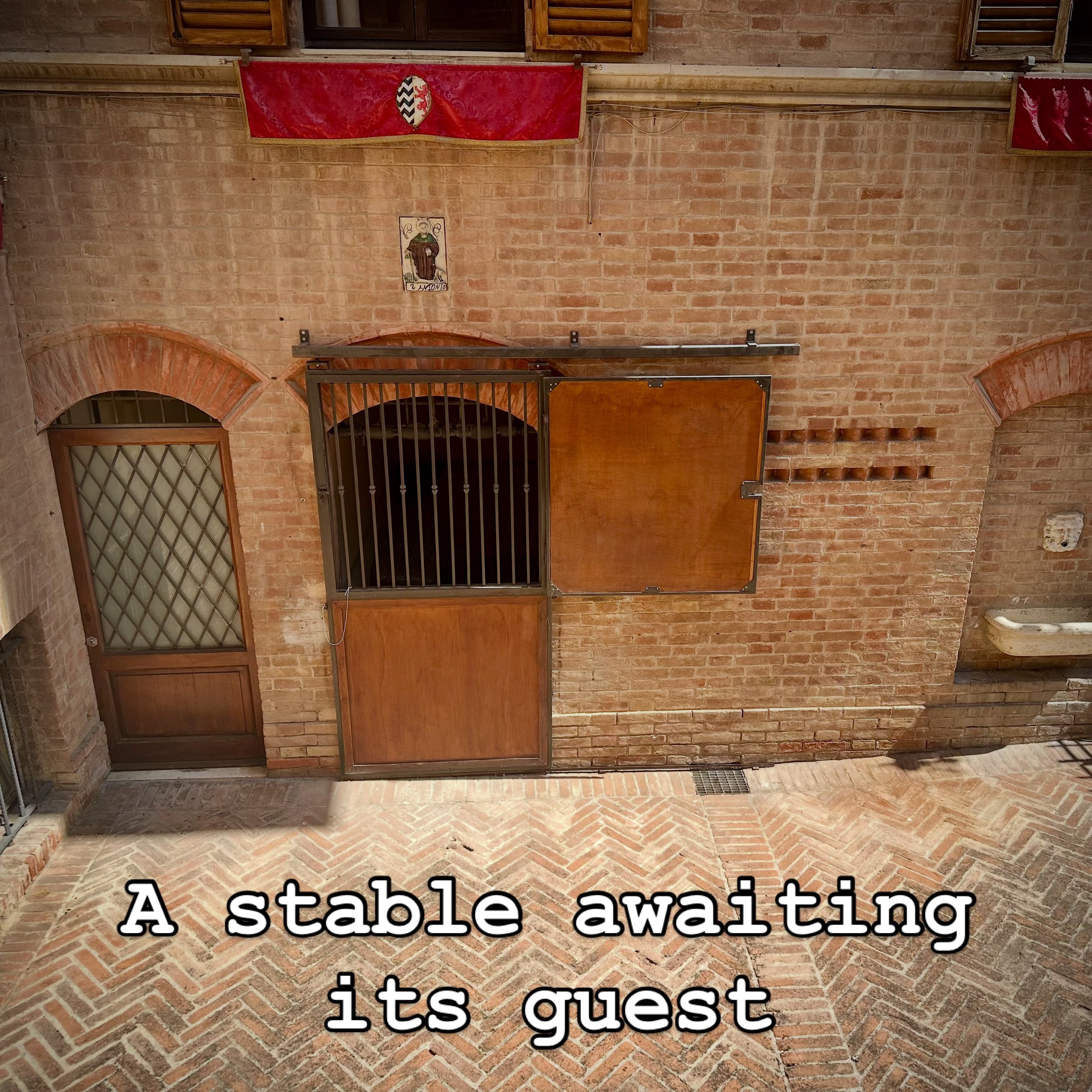 12 August, Siena: Today is the last day we can relax before the Palio. The stables have been aired out, fresh hay will soon be placed there, along with clean sheets for the Palio staff (yes, they sleep alongside the horse!). Tables have been set up b