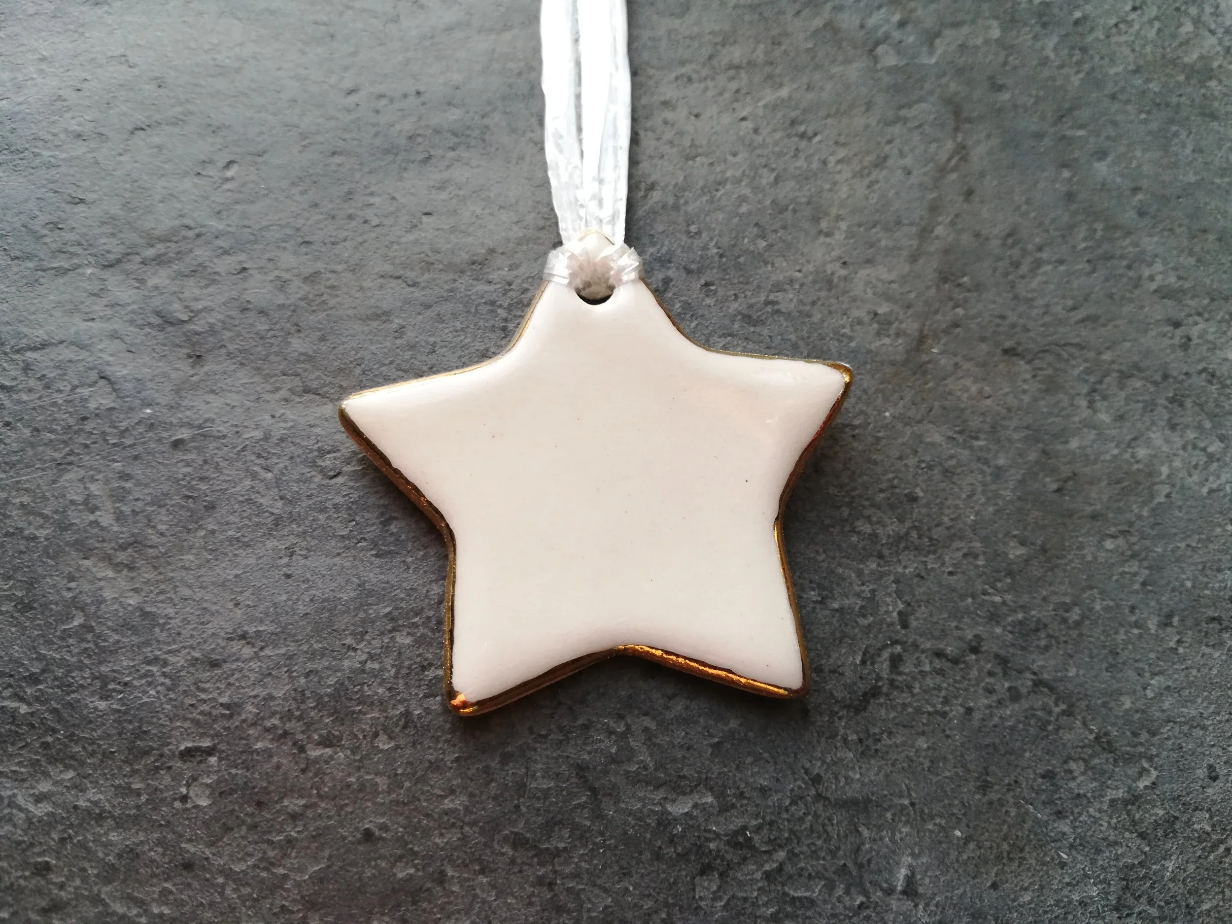 Heidi Kunkel porcelain star ornament Seattle handmade pottery Heidi's Pottery
