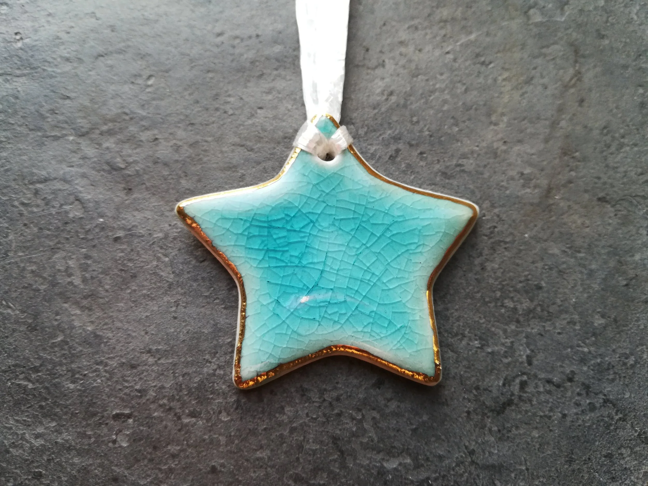 Heidi Kunkel porcelain star ornament Seattle handmade pottery Heidi's Pottery