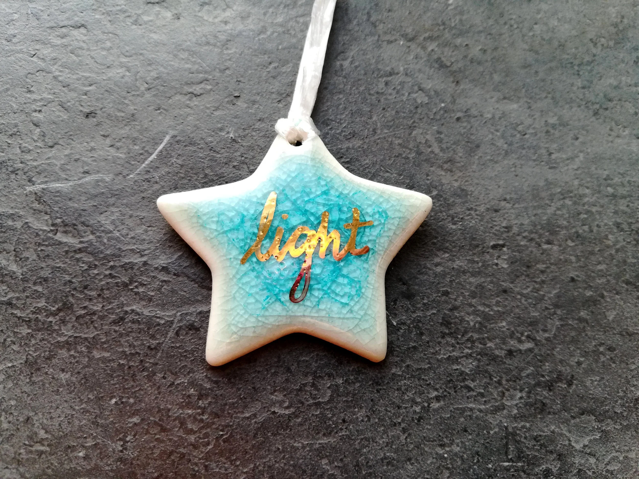 Heidi Kunkel porcelain star ornament Seattle handmade pottery Heidi's Pottery