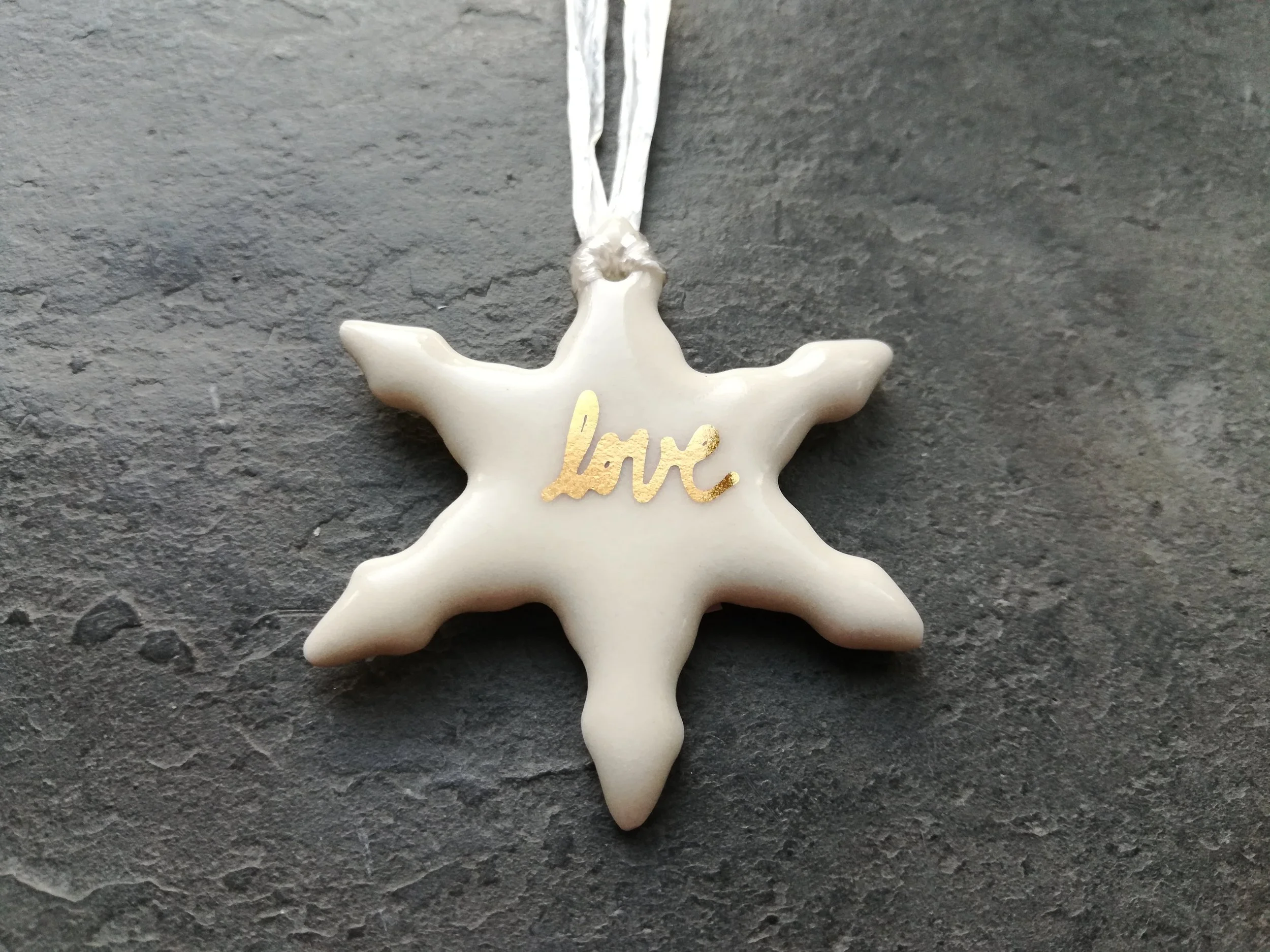 Heidi Kunkel porcelain snowflake ornament Seattle handmade pottery Heidi's Pottery