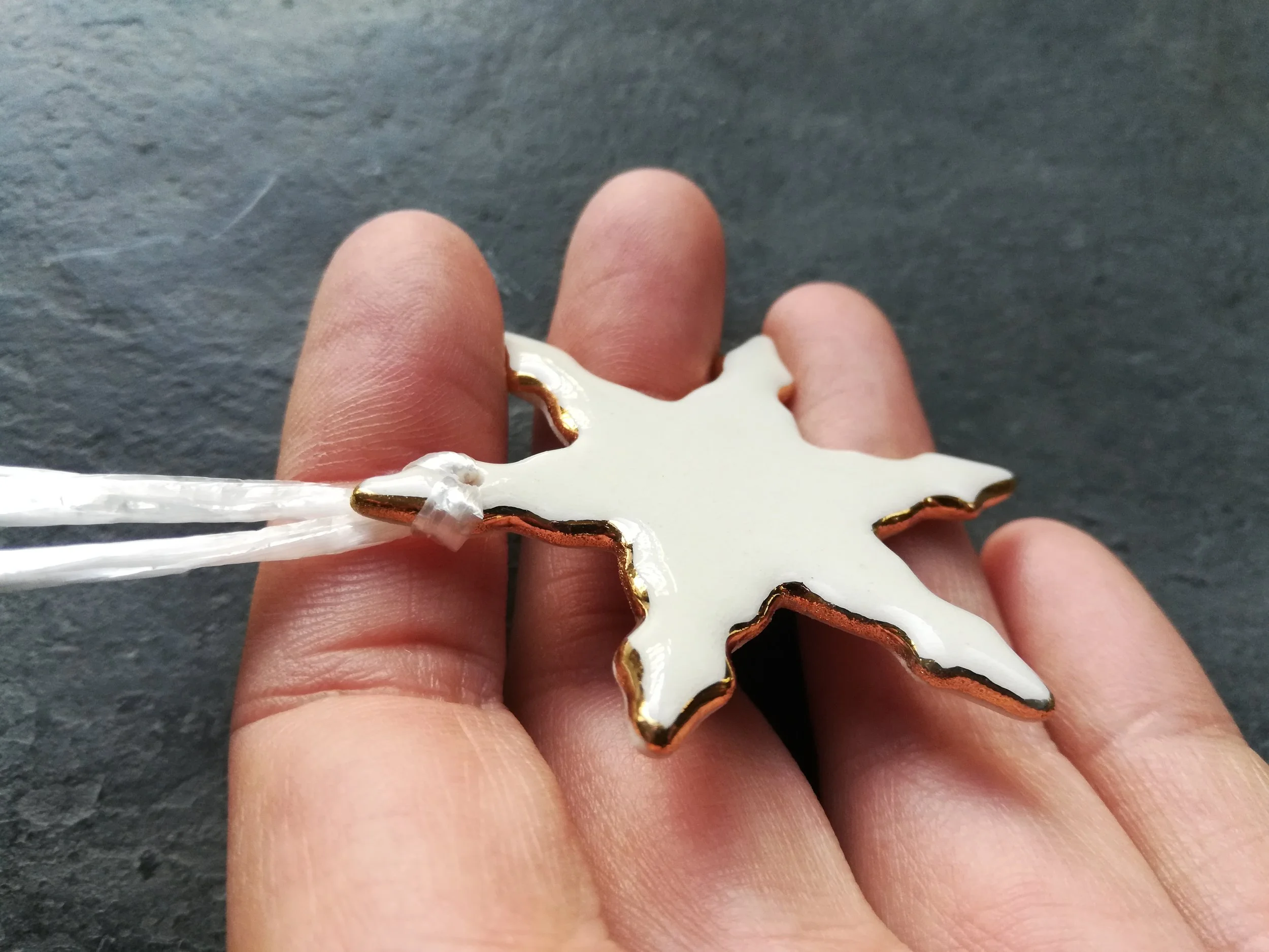 Heidi Kunkel porcelain snowflake ornament Seattle handmade pottery Heidi's Pottery