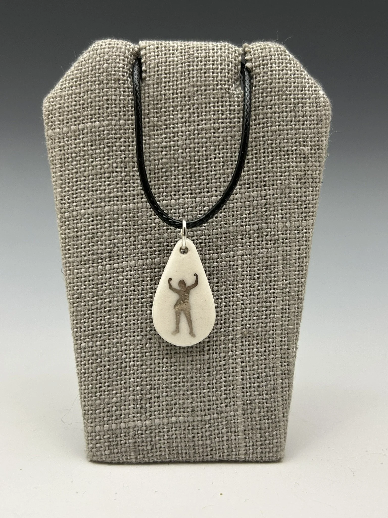 pendant - teardrop silver on cord 1.JPEG