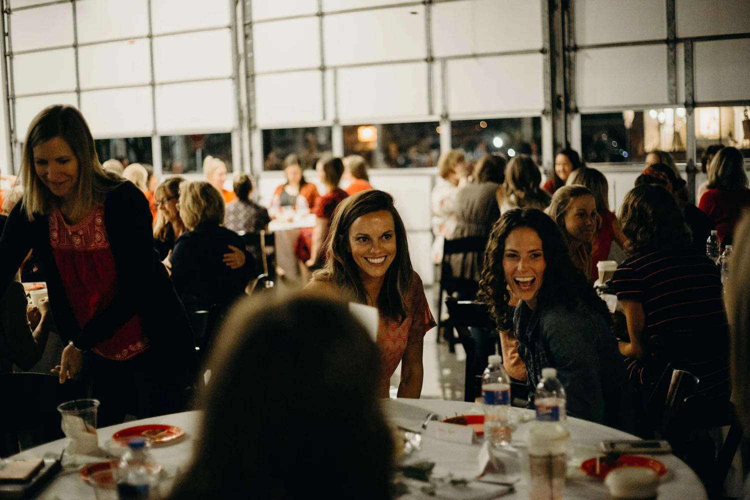 WEB-Red-Women-Laughing-at-table.jpg