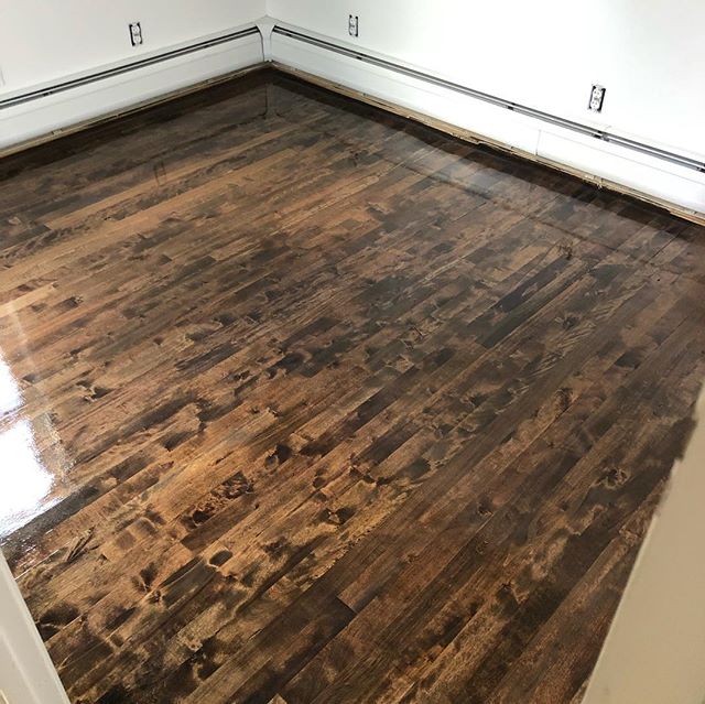 Check out this outcome of this mixed wood floors some beech, birch, maple, Douglas fur, southern yellow pine with red oak stairs all water popped and stained Jacobean stain finish with 3 coats of stain poly.
