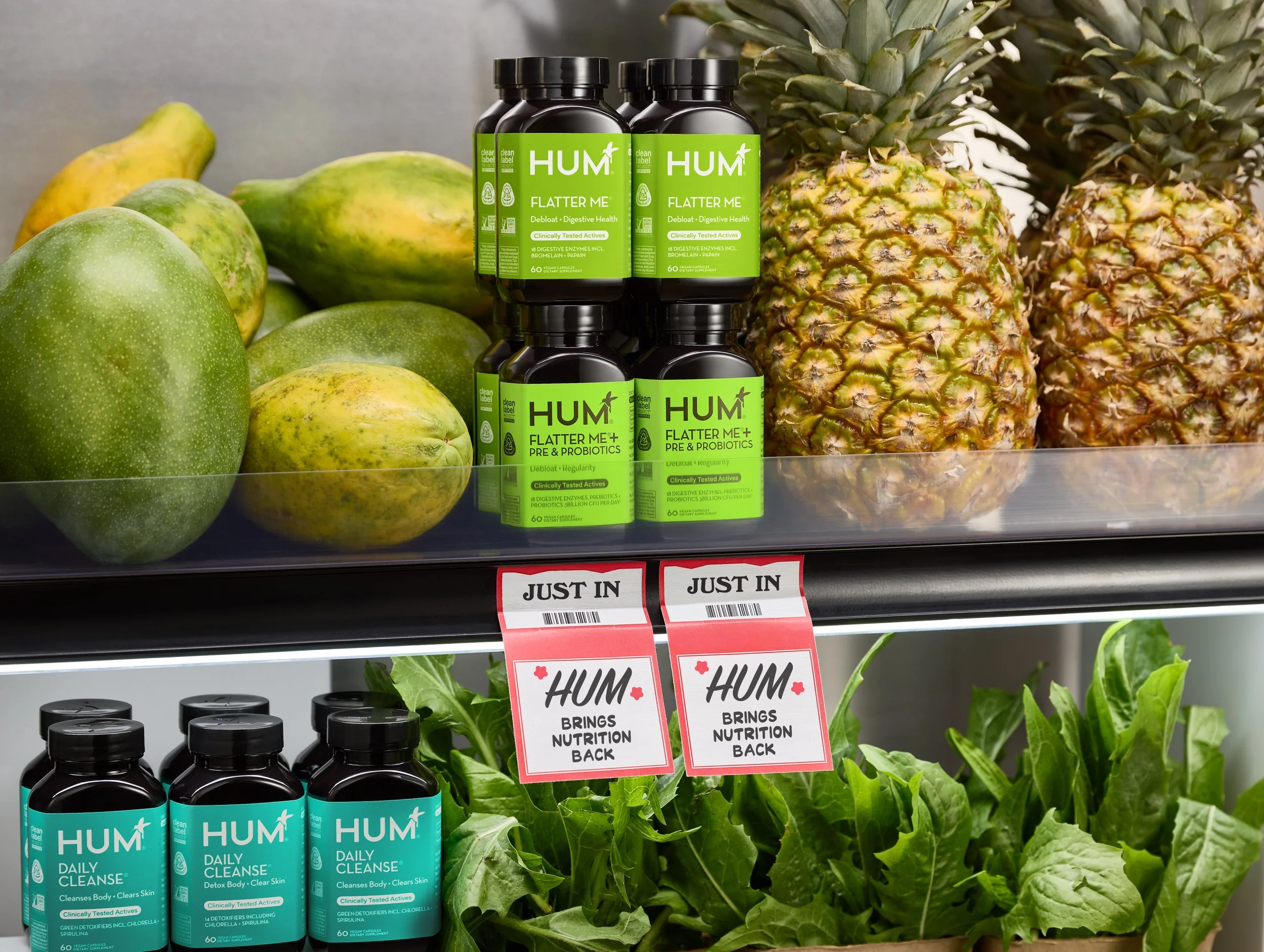 DANA KAPUSTIN Product Stylist, Set Designer, Prop Stylist featuring HUM Nutrition flatter me, daily cleanse on fruit shelves
