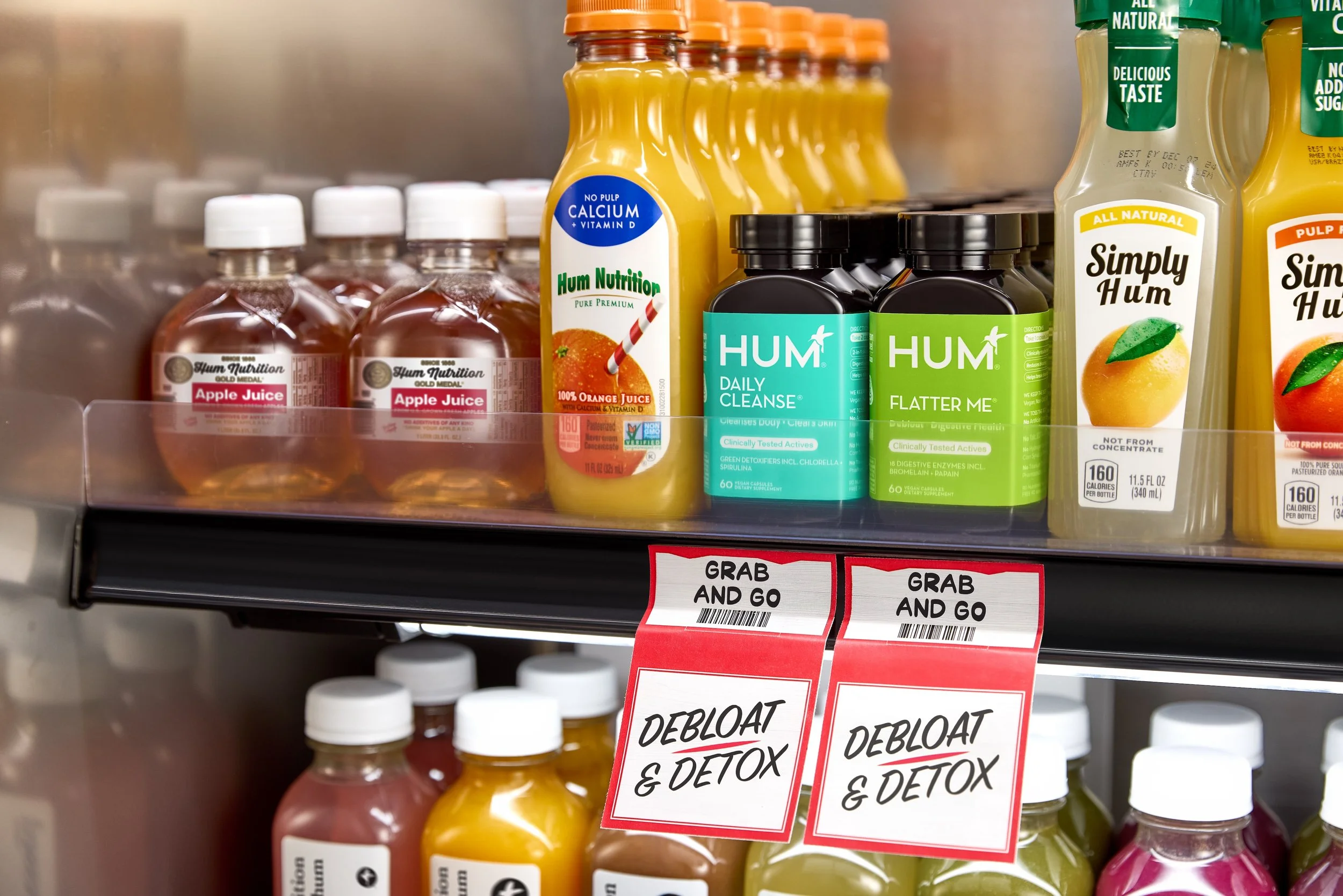 dana kapustin Los Angeles based set designer, prop stylist, food and beverage, created a fake juice aisle featuring hum nutrition's flatter me bottles.