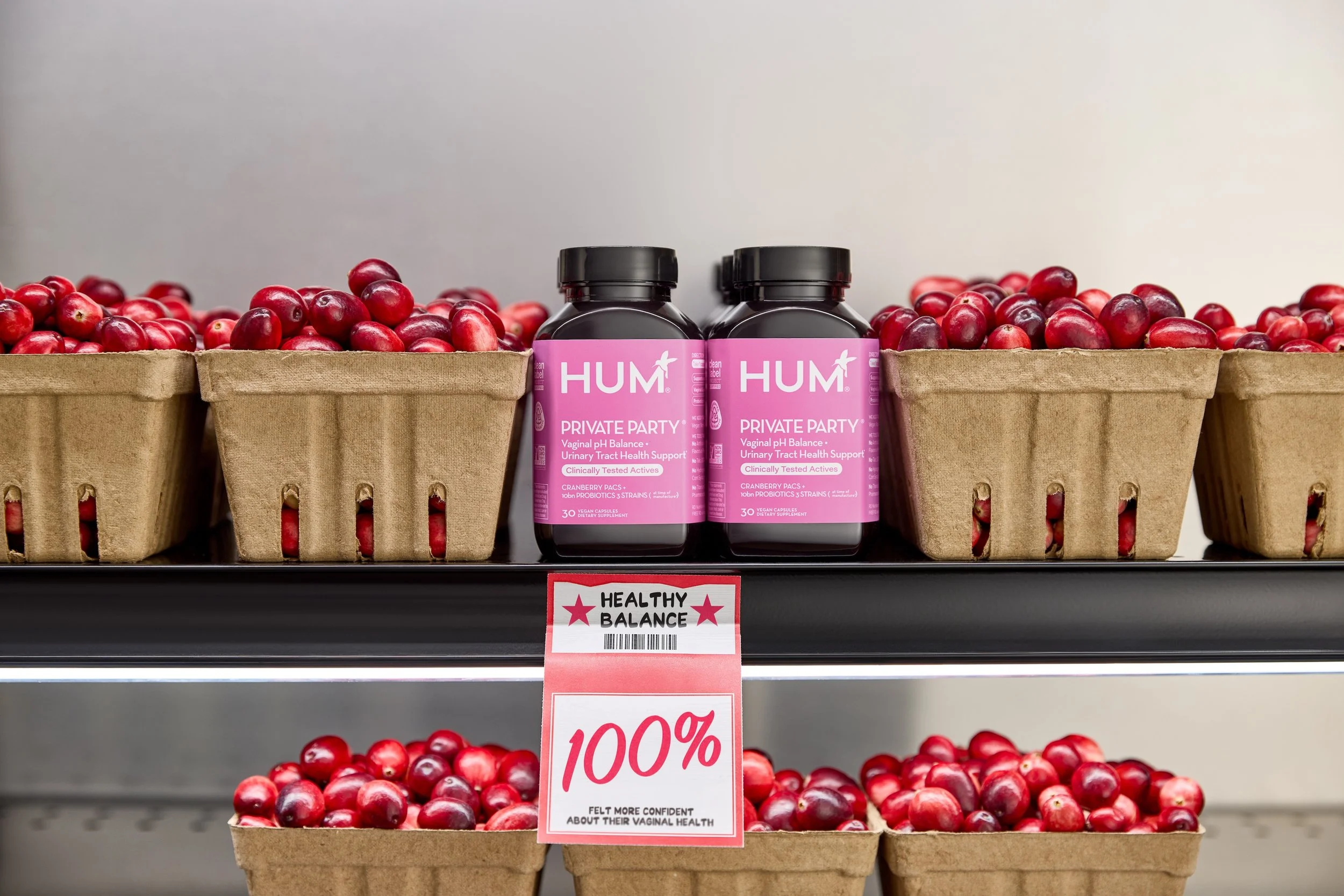 set design by DANA KAPUSTIN prop stylist and art director cranberies on fruit shelf featuring HUM Nutrition private party