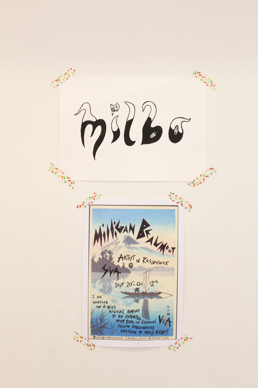 Milligan posters on door.JPG