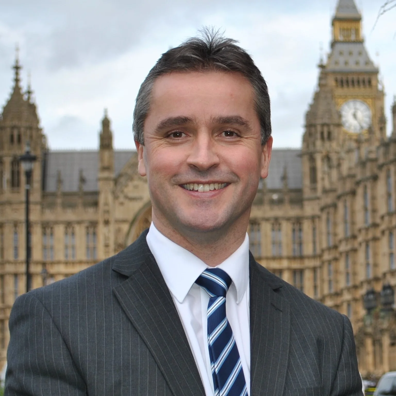 Angus Brendan headshot square.jpg