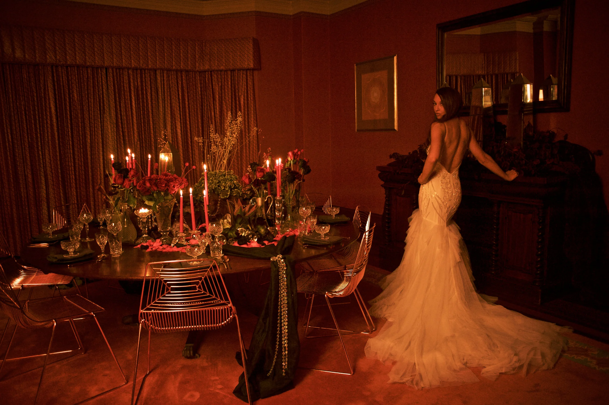 beautiful bride in a room with candles