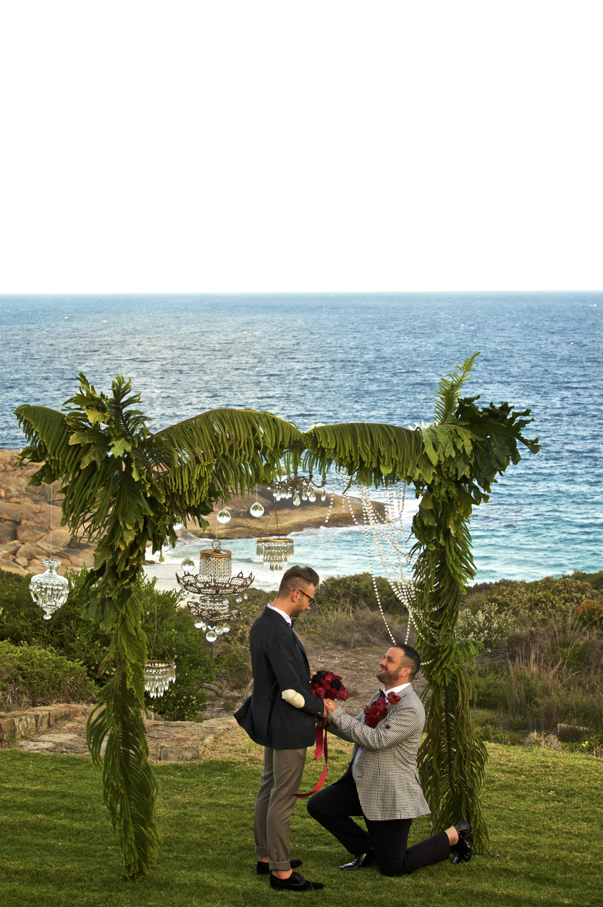 wedding couple under alter on the knees vows promise or proposing