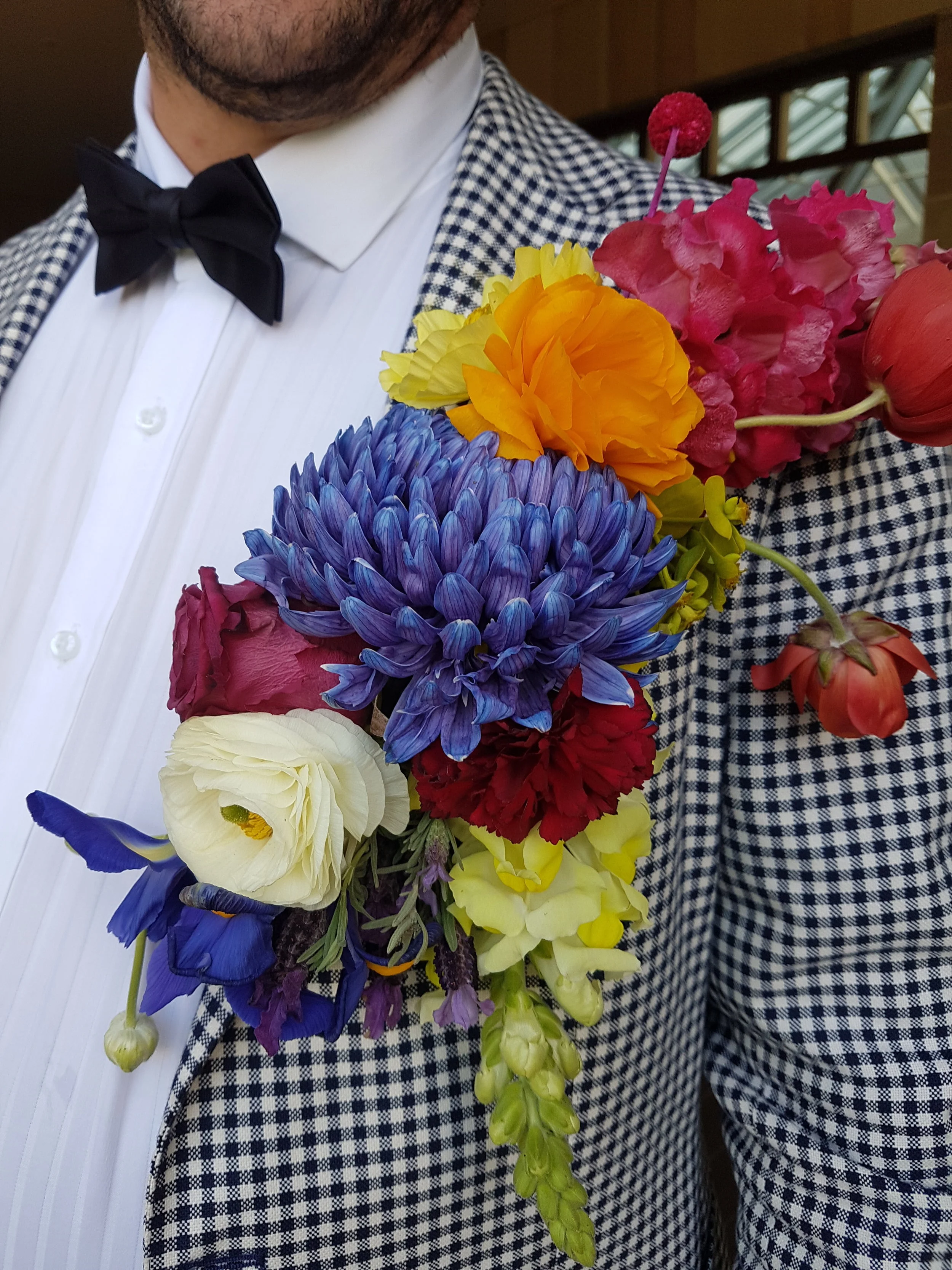 beautiful wedding with flowers on the brides garment