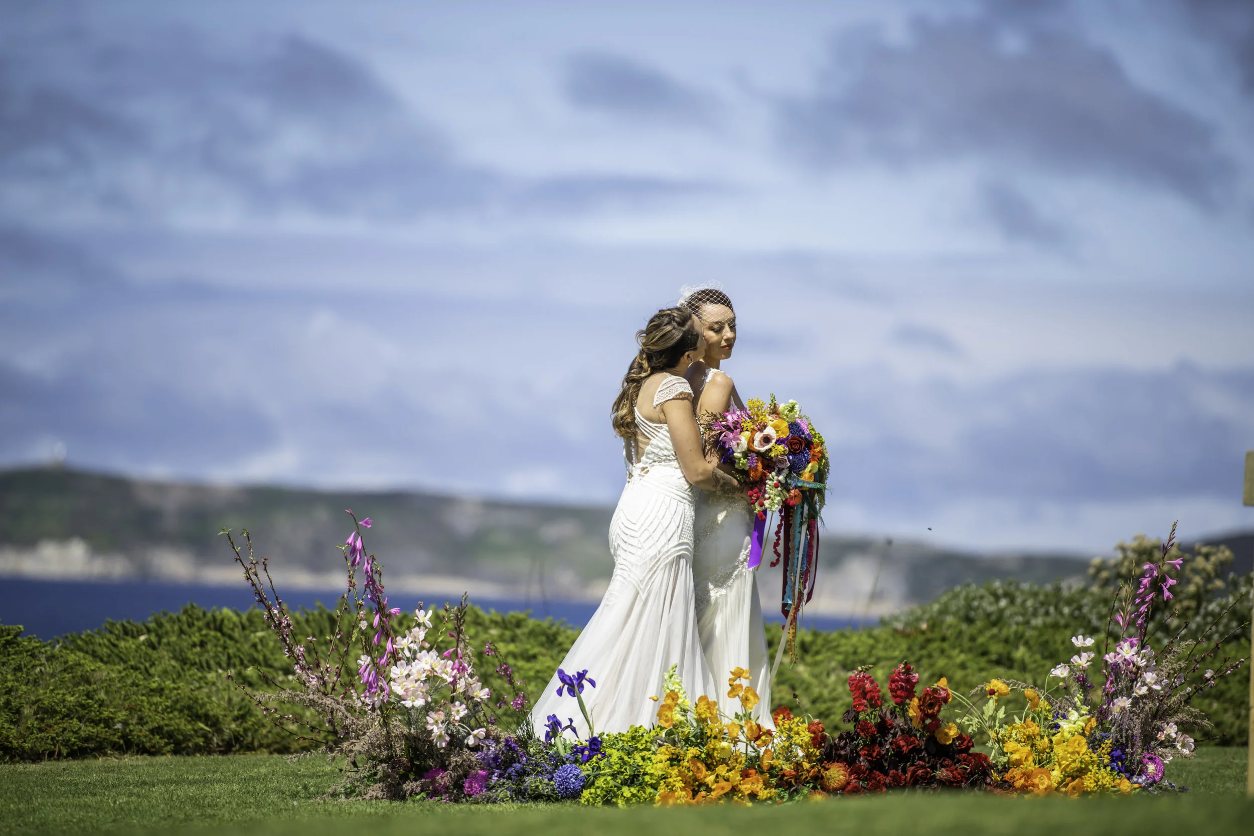 beautiful couple after wedding with flowers