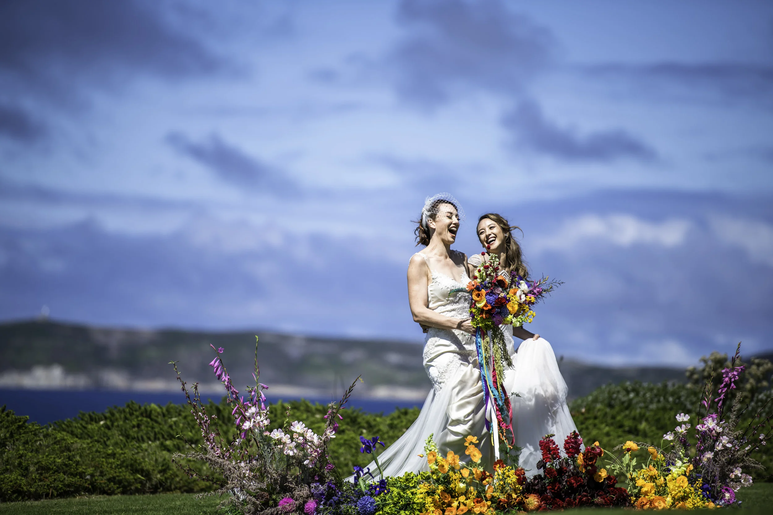 beautiful couple after wedding with flowers walking