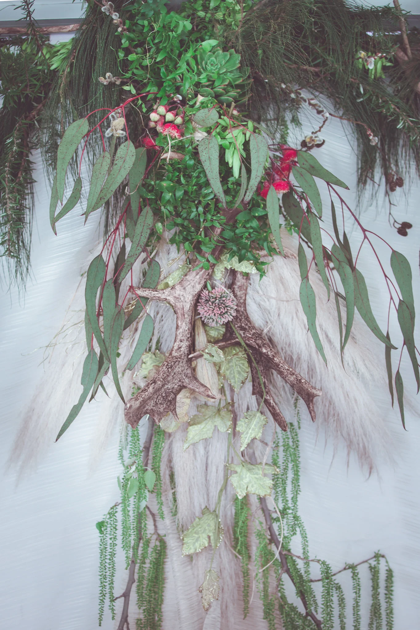 wedding white flowers and feathers hanging decoration