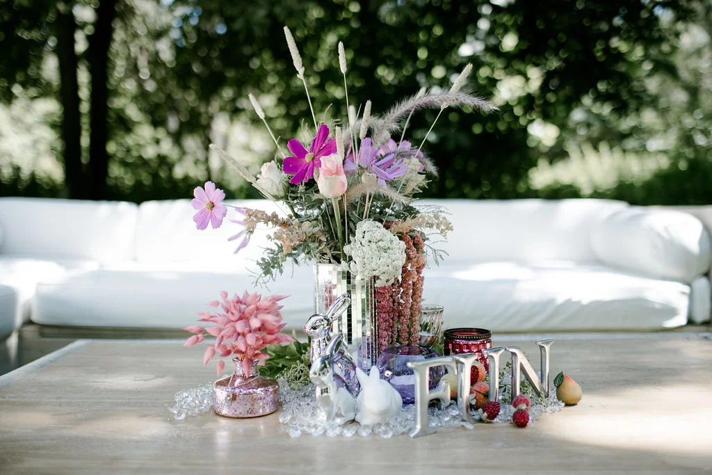 long white couch love pillows decorative flowers on the table