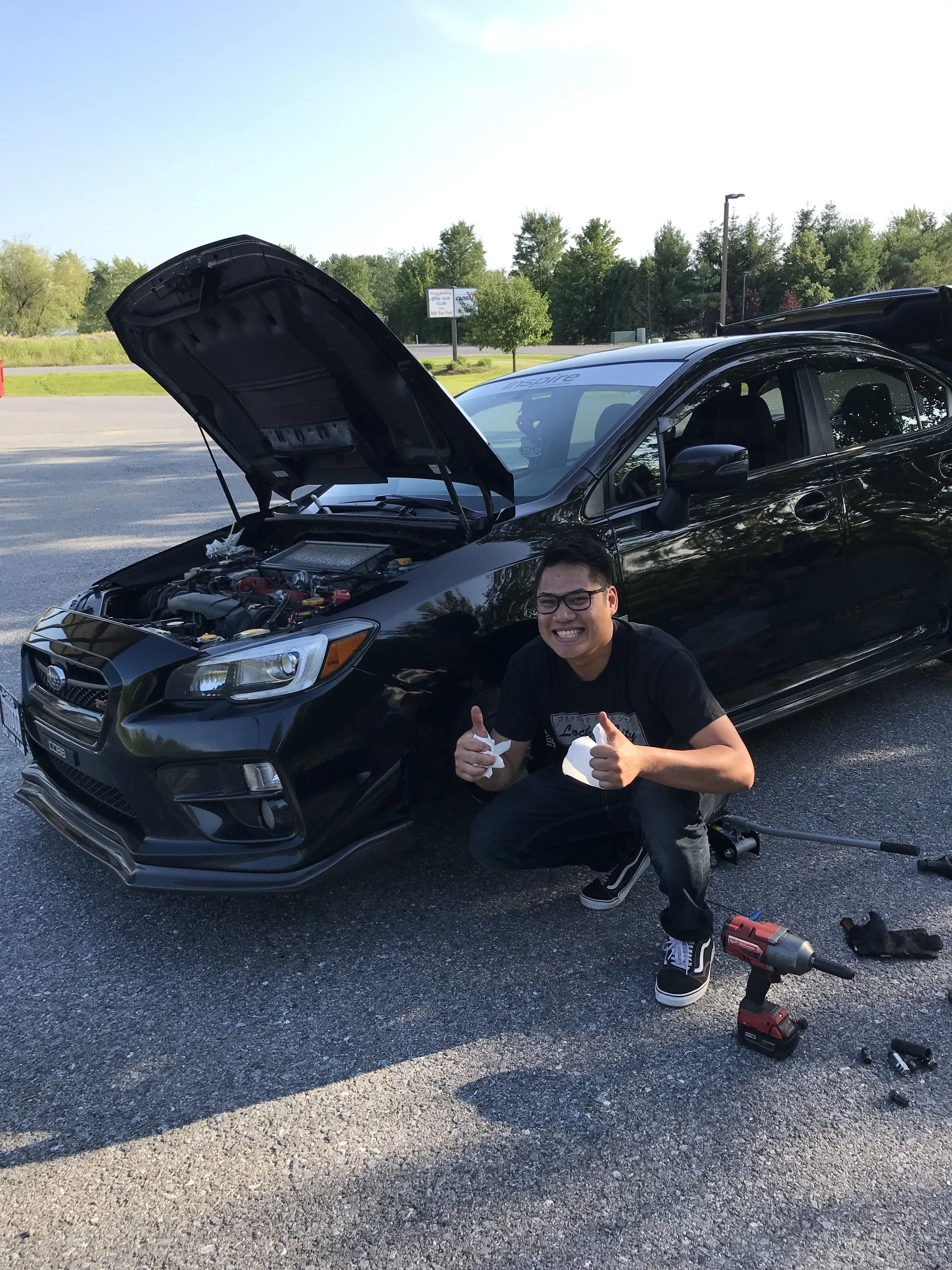 Parking lot mechanic at its finest.