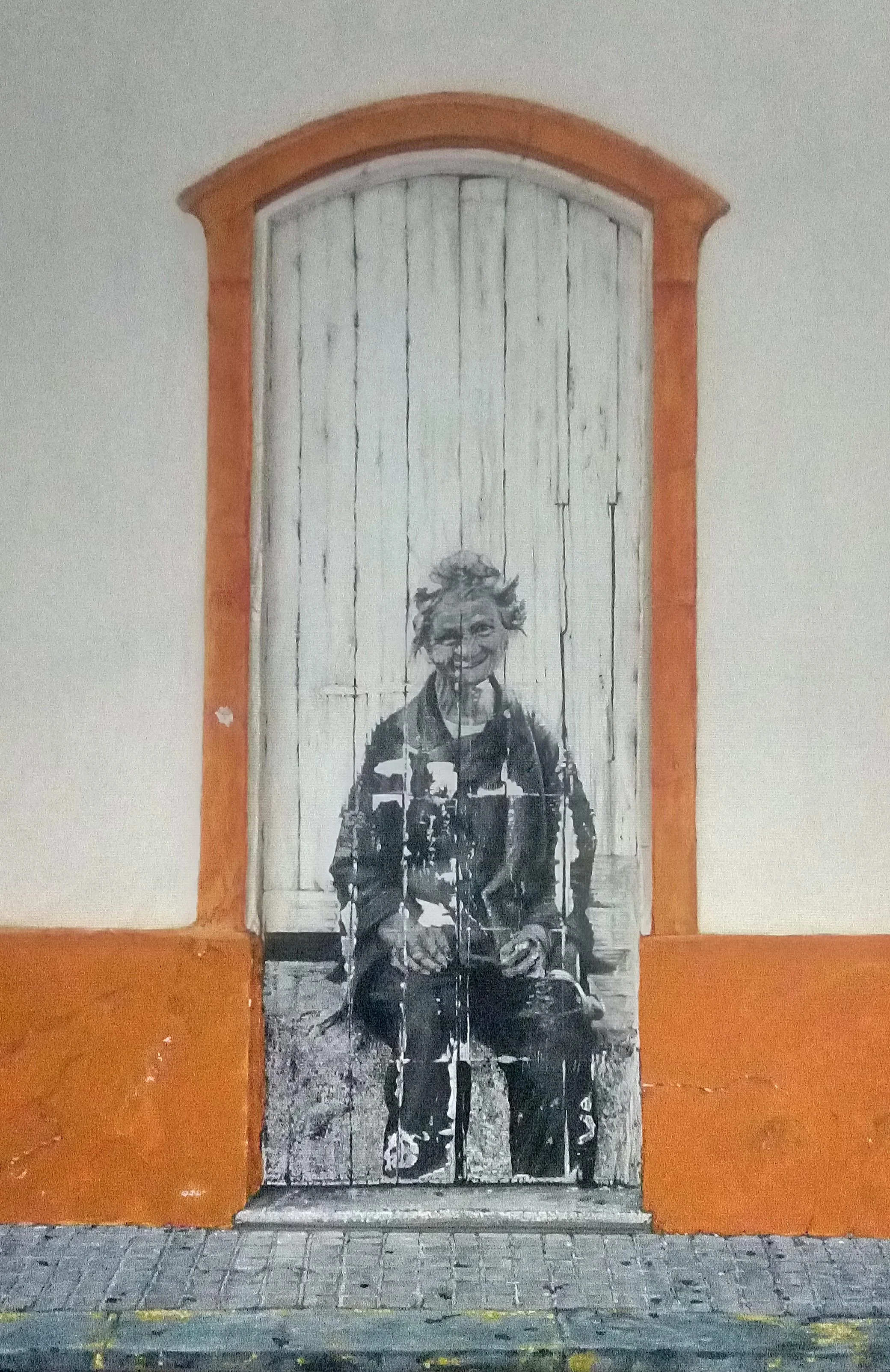 Paulo Gago - Door with Poster of Old Woman